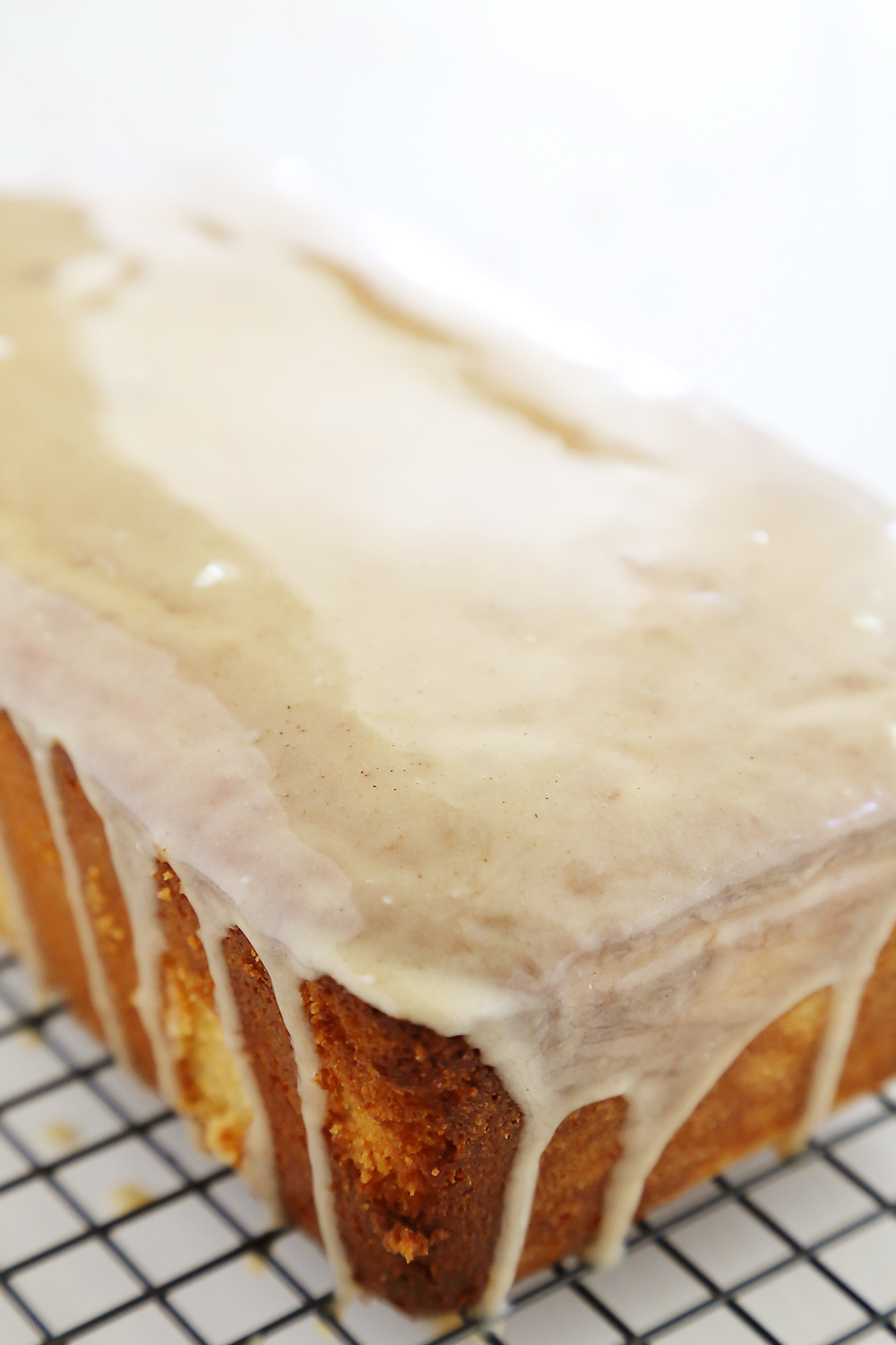 Vanilla Ricotta Pound Cake with Maple Glaze - Super moist, buttery vanilla pound cake with a spiced maple-cinnamon glaze. Thecomfortofcooking.com