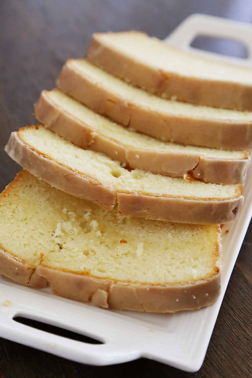 Vanilla Ricotta Pound Cake with Maple Glaze - Super moist, buttery vanilla pound cake with a spiced maple-cinnamon glaze. Thecomfortofcooking.com