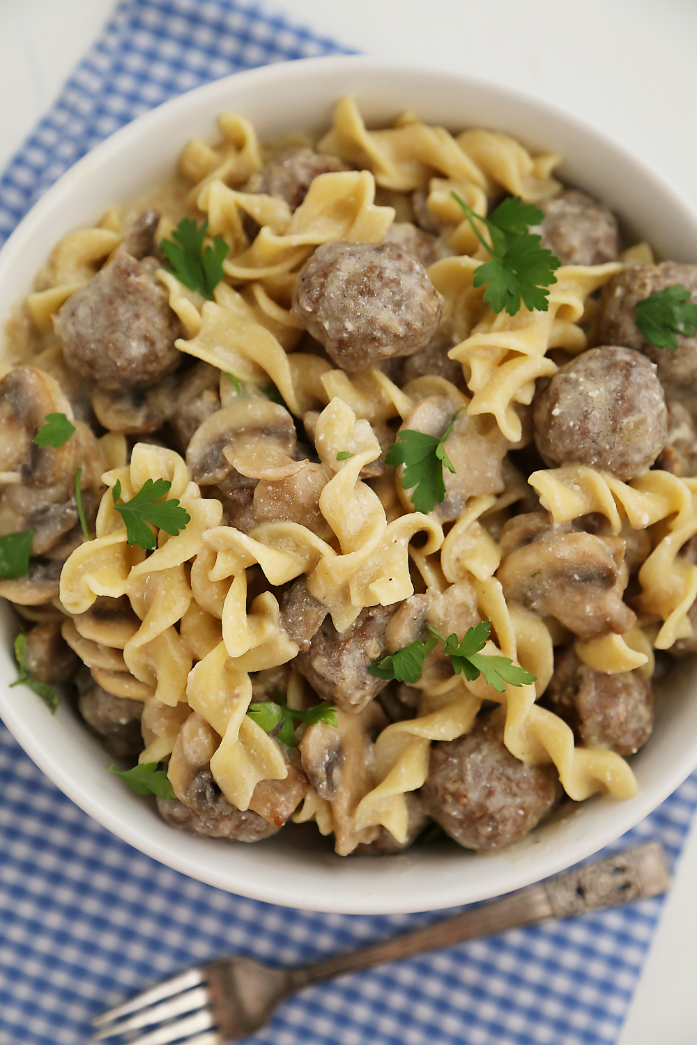 Creamy Mushroom Meatball Stroganoff – Super creamy stroganoff with fresh mushrooms and hearty meatballs, made easily from scratch! Thecomfortofcooking.com