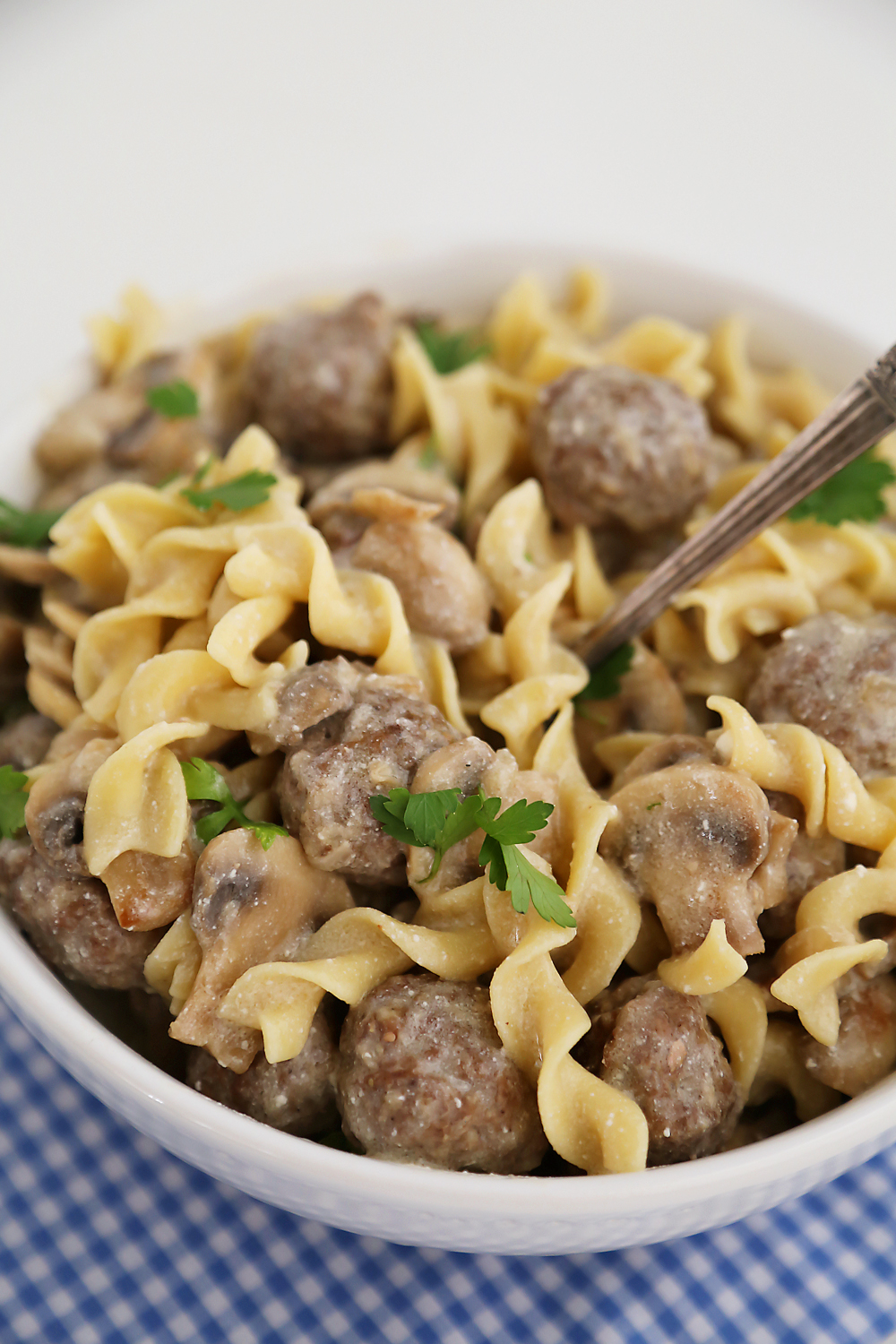 Creamy Mushroom Meatball Stroganoff – Super creamy stroganoff with fresh mushrooms and hearty meatballs, made easily from scratch! Thecomfortofcooking.com