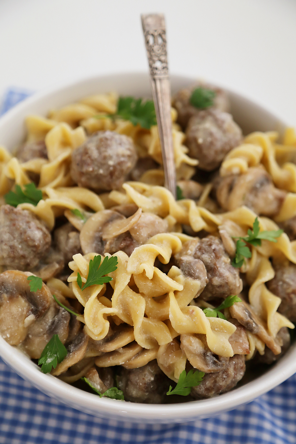 Creamy Mushroom Meatball Stroganoff – Super creamy stroganoff with fresh mushrooms and hearty meatballs, made easily from scratch! Thecomfortofcooking.com