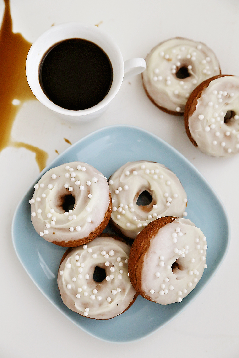 Soft Pumpkin Donuts with Cream Cheese Glaze - Super soft, spiced pumpkin donuts are so fragrant, simple and scrumptious. Baked not fried! Thecomfortofcooking.com