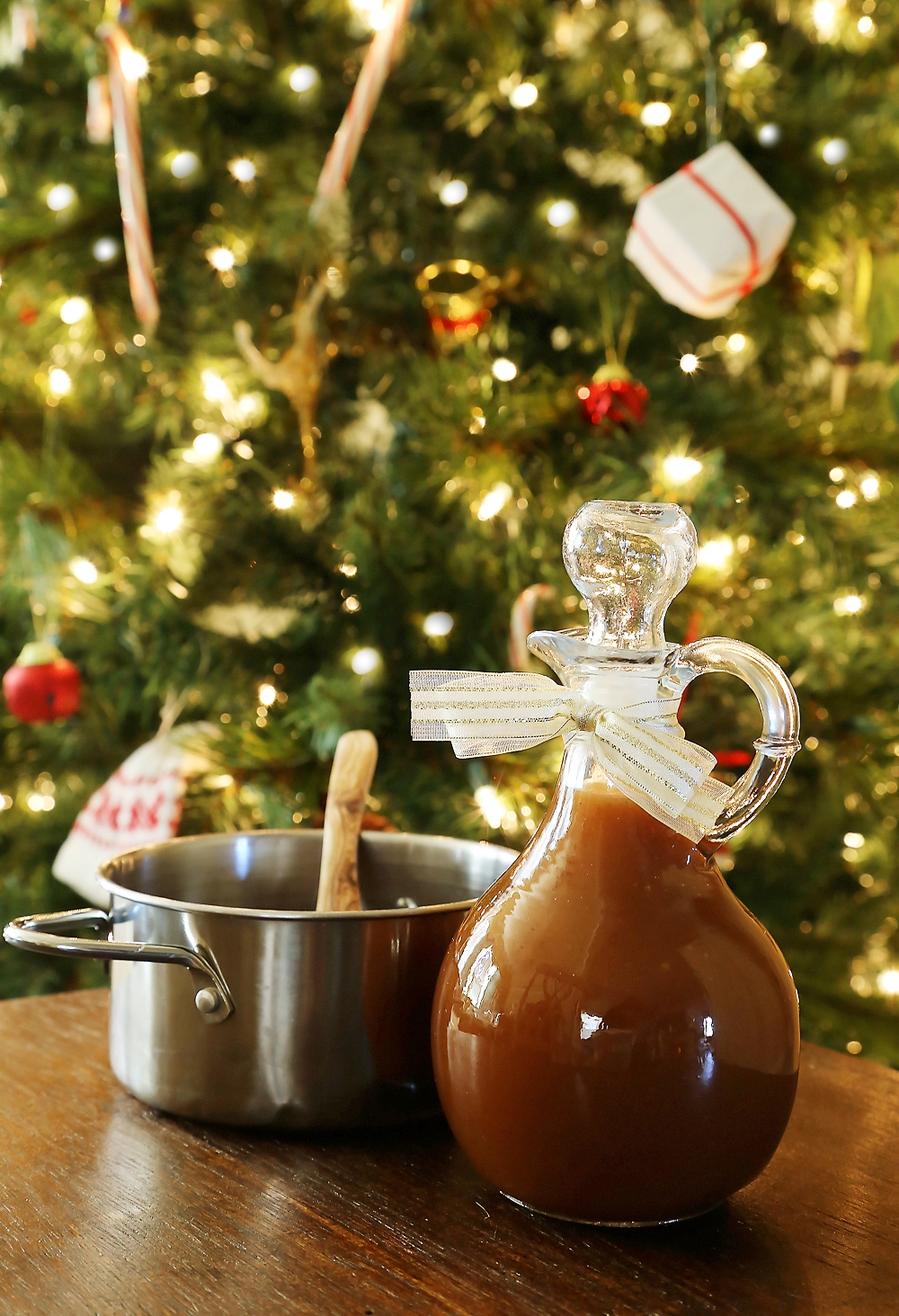 Easy Homemade Apple Cider Syrup – Velvety rich, cinnamon-spiced syrup is perfect on hot pancakes, waffles or French toast. Use in any recipe that calls for maple syrup + give as gifts! Thecomfortofcooking.com