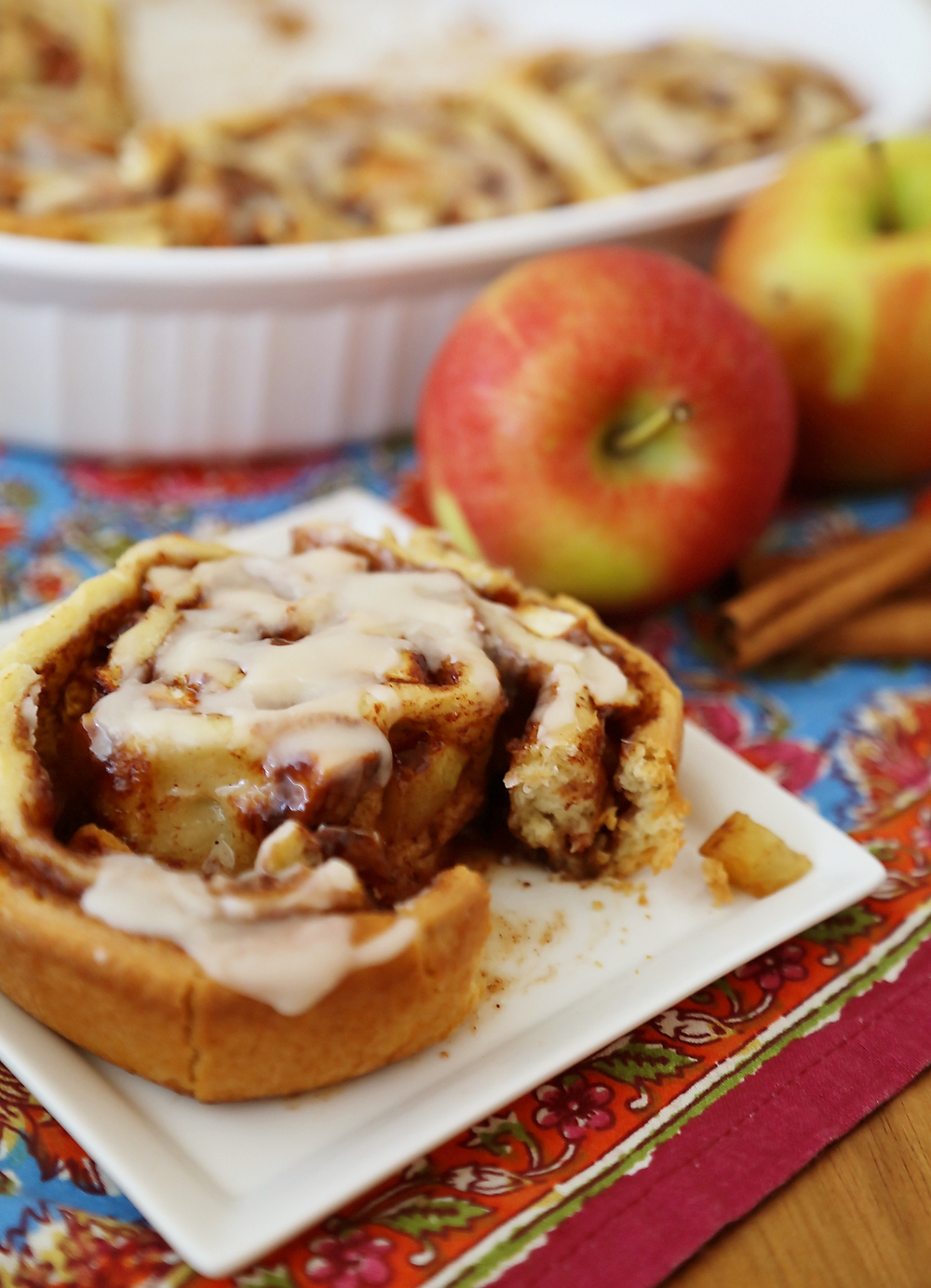 Gooey Apple Pie Cinnamon Rolls - These sticky, soft cinnamon rolls with fresh apples taste like the classic pie and breakfast treat rolled into one! Thecomfortofcooking.com