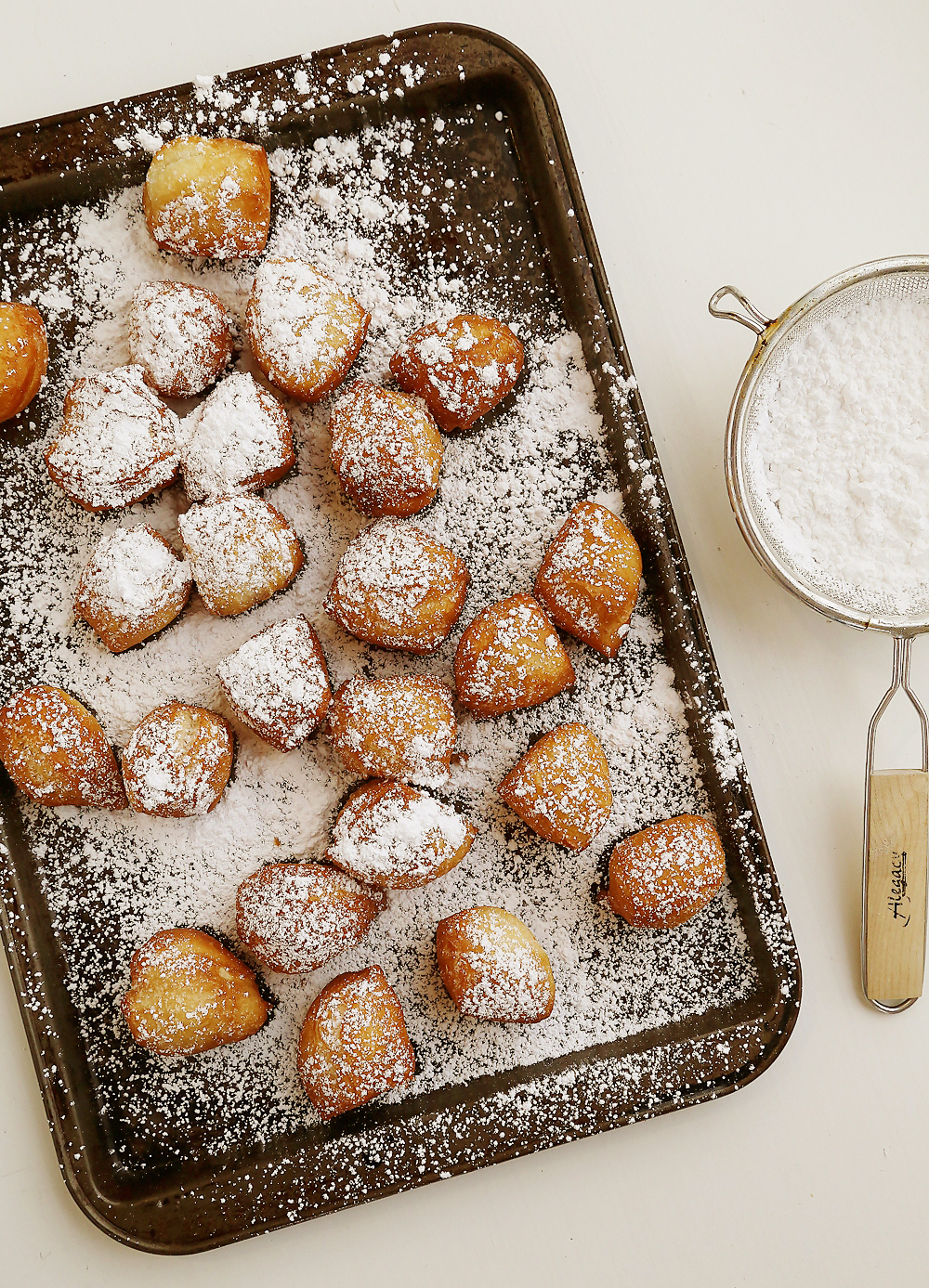 3-Ingredient Beignet Bites - Deliciously fluffy, soft mini beignets made easily for breakfast, brunch or dessert! Thecomfortofcooking.com