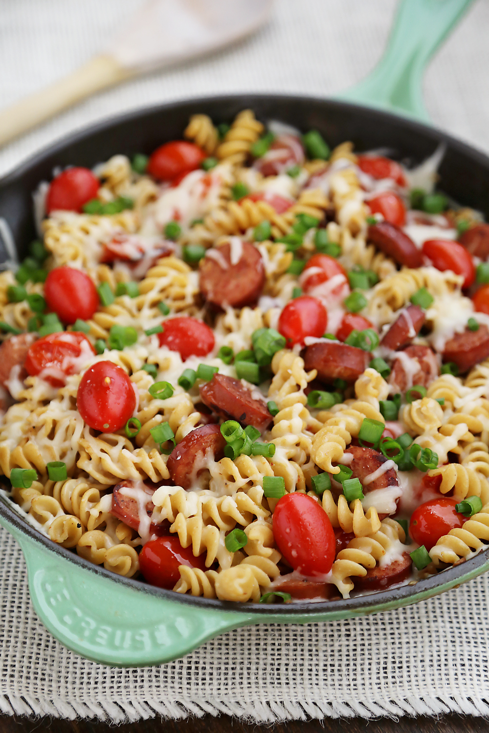 Cheesy Sausage and Tomato Pasta Skillet – This 15-minute dinner is so delicious and easy to whip up on weeknights! Thecomfortofcooking.com