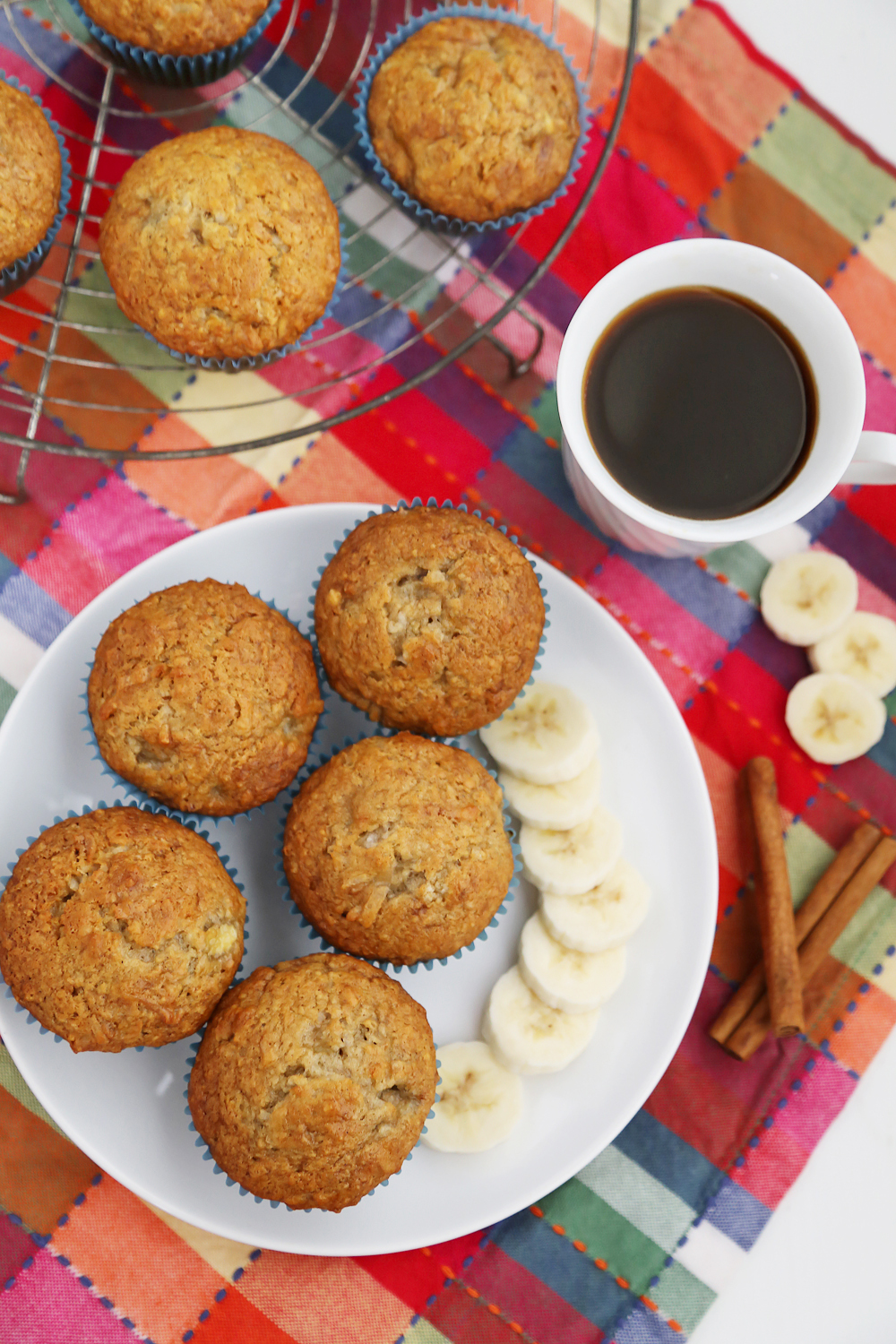 Toasted Coconut Banana Muffins - Super moist, fluffy banana muffins. These make a mouthwatering treat that pairs perfectly with your morning coffee! Thecomfortofcooking.com