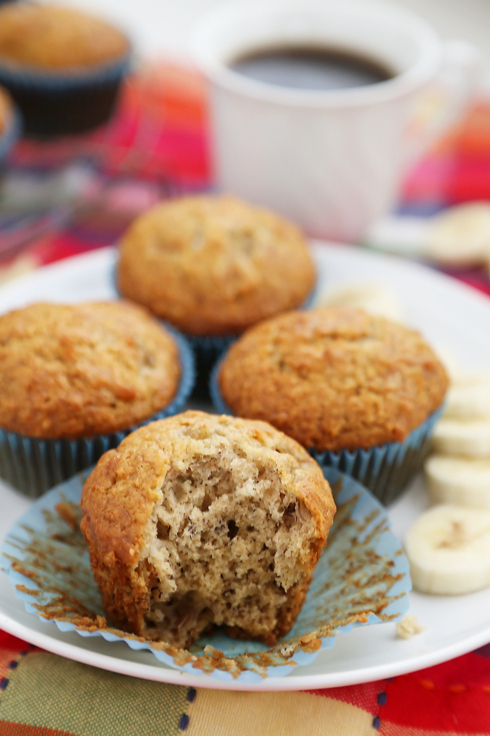 Toasted Coconut Banana Muffins - Super moist, fluffy banana muffins. These make a mouthwatering treat that pairs perfectly with your morning coffee! Thecomfortofcooking.com