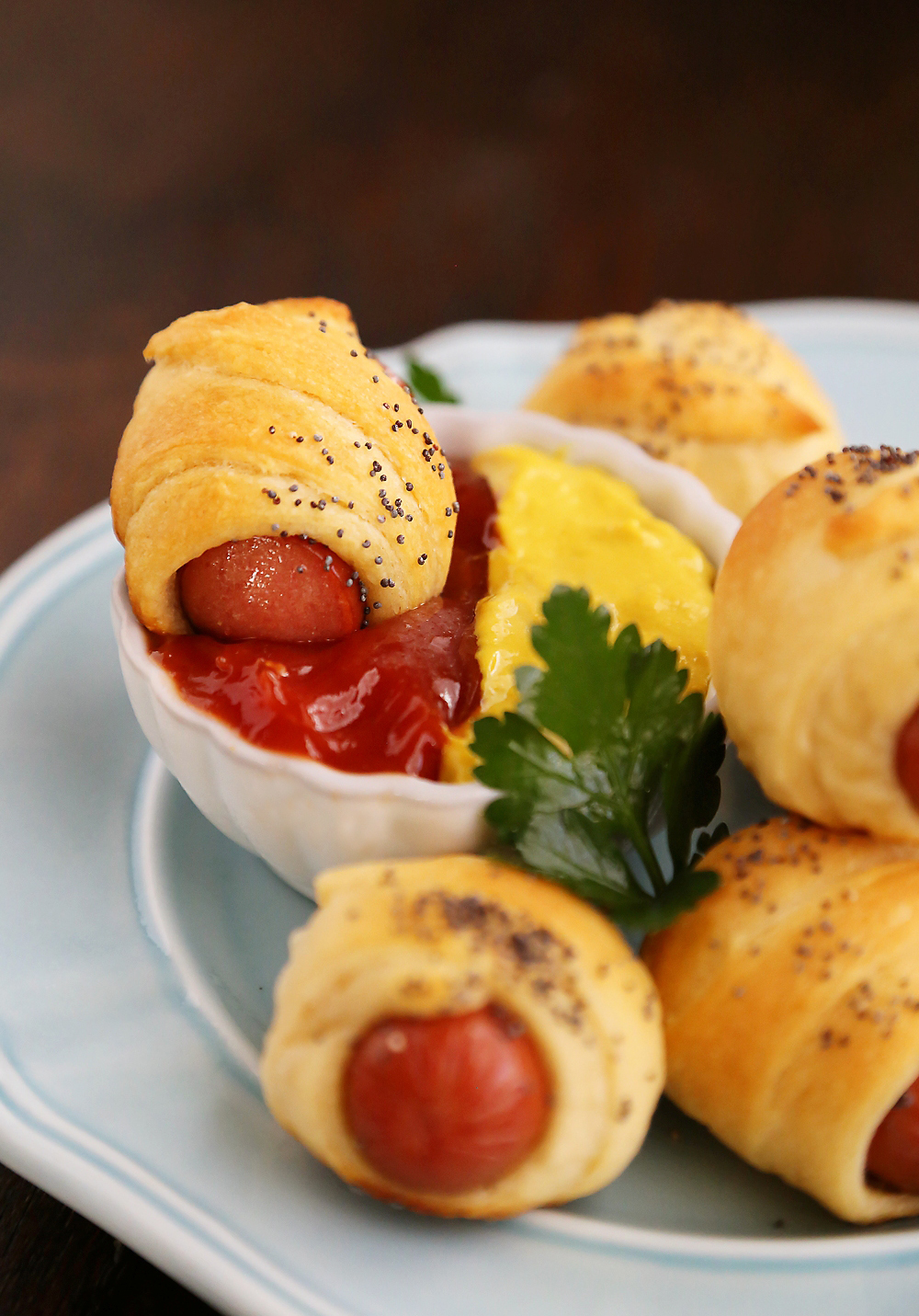 3-Ingredient Crescent Hot Dog Rollups – These fluffy, buttery appetizer bites are perfect for parties + lunchboxes! So delicious and fun to make with kids! Thecomfortofcooking.com