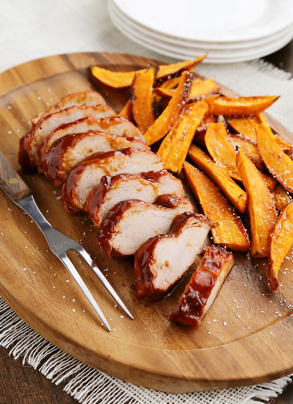 BBQ Pork Tenderloin with Sweet Potato Fries – Try this 5-ingredient one-pan weeknight dinner! So quick, easy and delicious! Thecomfortofcooking.com