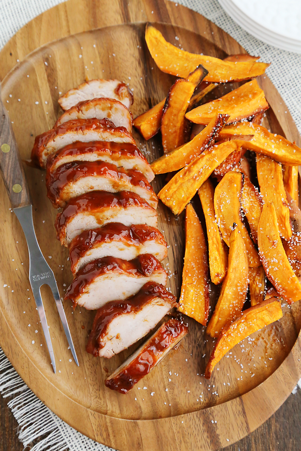 BBQ Pork Tenderloin with Sweet Potato Fries – Try this 5-ingredient one-pan weeknight dinner! So quick, easy and delicious! Thecomfortofcooking.com