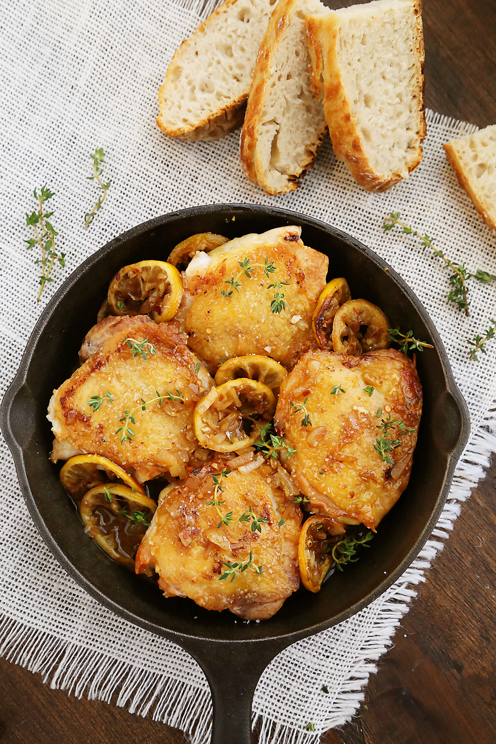 Skillet Crispy Lemon Chicken with White Wine Sauce - This one-skillet dish is deliciously easy for weeknights or elegant dinners in. Serve w. crusty bread for dipping! Thecomfortofcooking.com