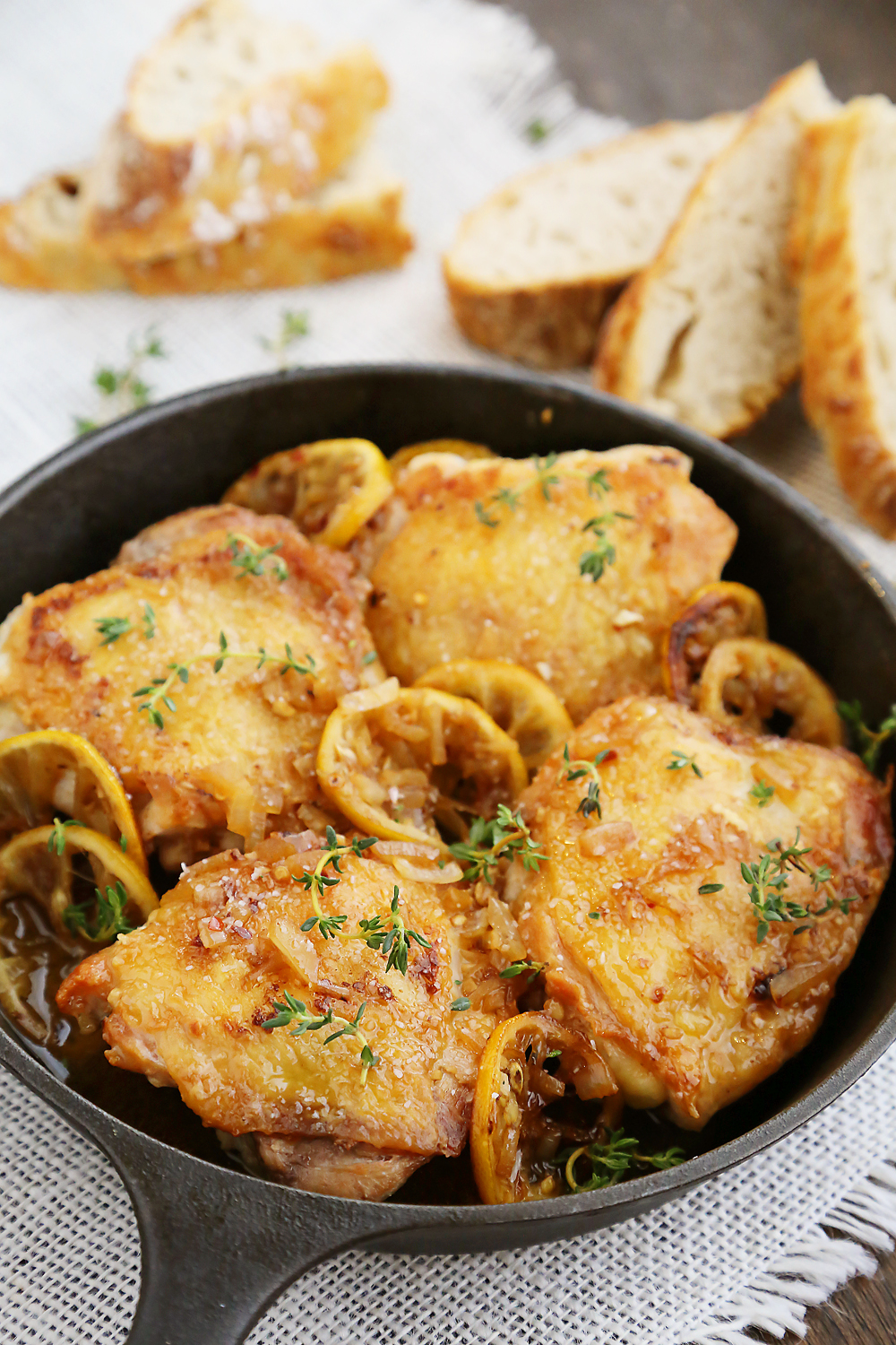 Skillet Crispy Lemon Chicken with White Wine Sauce - This one-skillet dish is deliciously easy for weeknights or elegant dinners in. Serve w. crusty bread for dipping! Thecomfortofcooking.com