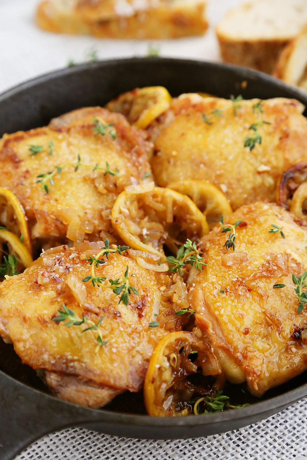 Skillet Crispy Lemon Chicken with White Wine Sauce - This one-skillet dish is deliciously easy for weeknights or elegant dinners in. Serve w. crusty bread for dipping! Thecomfortofcooking.com
