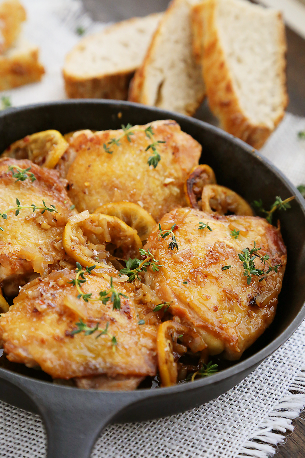 Skillet Crispy Lemon Chicken with White Wine Sauce - This one-skillet dish is deliciously easy for weeknights or elegant dinners in. Serve w. crusty bread for dipping! Thecomfortofcooking.com