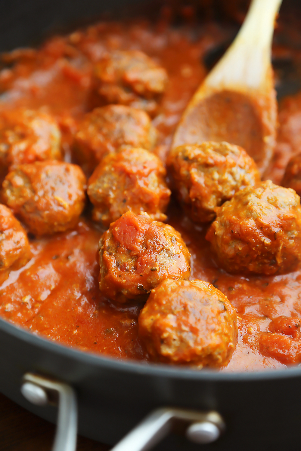 Cheesy Garlic Bread Meatball Sliders - These cheesy, garlic butter mini meatball subs are perfect for parties, snacks and weeknight meals + holidays! Easily homemade! Thecomfortofcooking.com