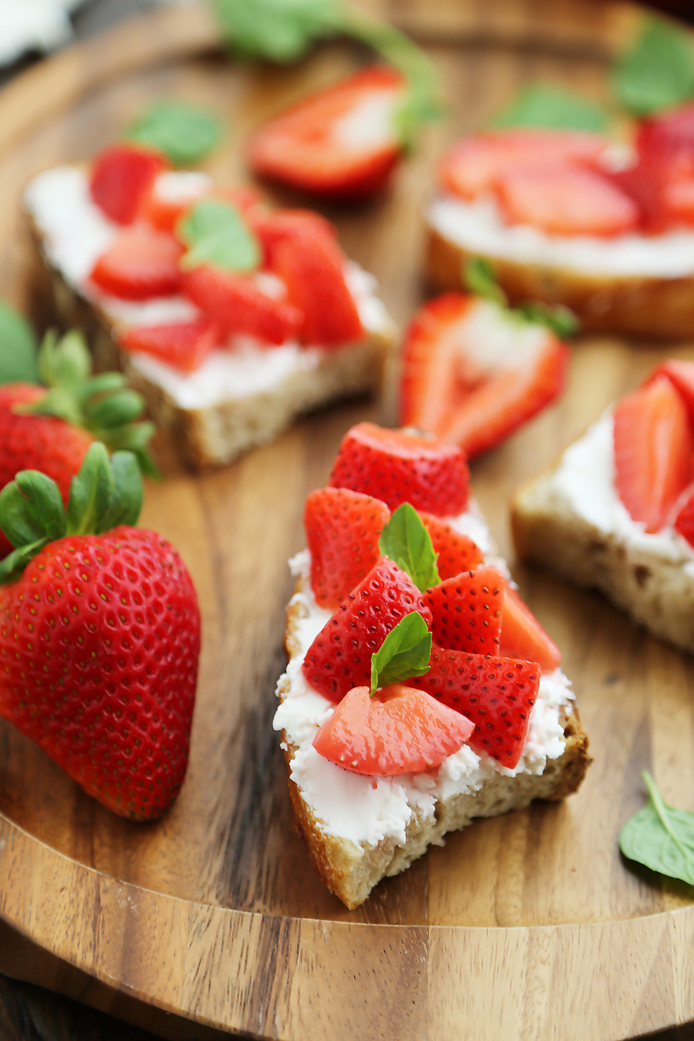 Vanilla Bean Pickled Strawberries with Goat Cheese Crostini - Sweet, tangy vanilla-scented pickled strawberries pair perfectly with goat cheese crostini! So simple, elegant and easy for parties. Thecomfortofcooking.com