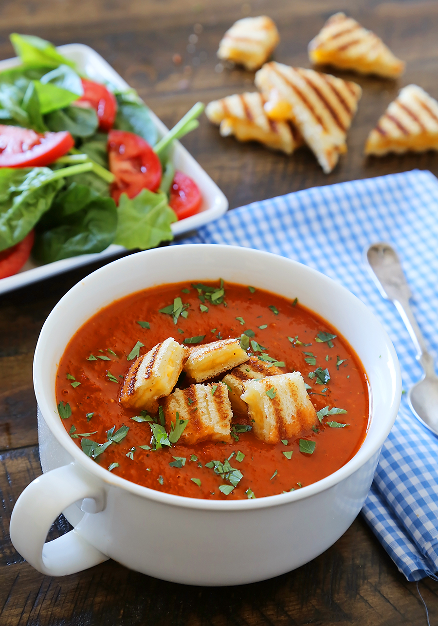 Tomato-Basil Soup with Grilled Cheese Croutons - Easy, healthy and hearty! Top with crispy, gooey grilled cheese croutons and serve with a green salad. thecomfortofcooking.com