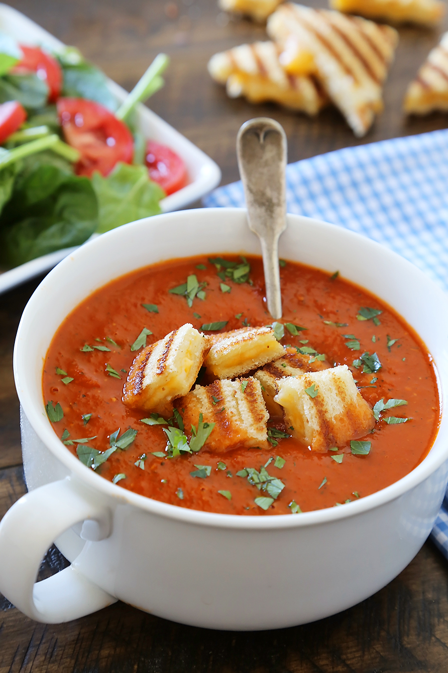 Tomato-Basil Soup with Grilled Cheese Croutons - Easy, healthy and hearty! Top with crispy, gooey grilled cheese croutons and serve with a green salad. thecomfortofcooking.com