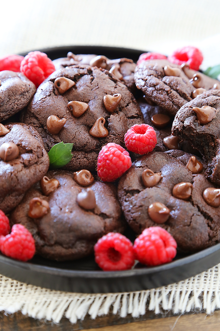 Soft & Chewy Double Chocolate Cookies - These cookies are melt-in-your-mouth good, and so easy to make. Less than 10 ingredients + 10 minutes in the oven! thecomfortofcooking.com
