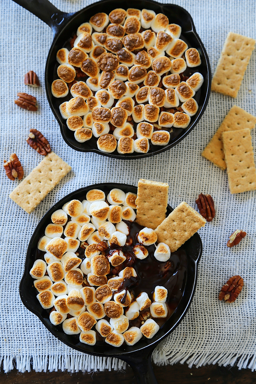 5-Ingredient Caramel Pecan S'mores Dip - Perfect for parties! Loaded with creamy caramel and pecans, this treat is super quick and easy! thecomfortofcooking.com