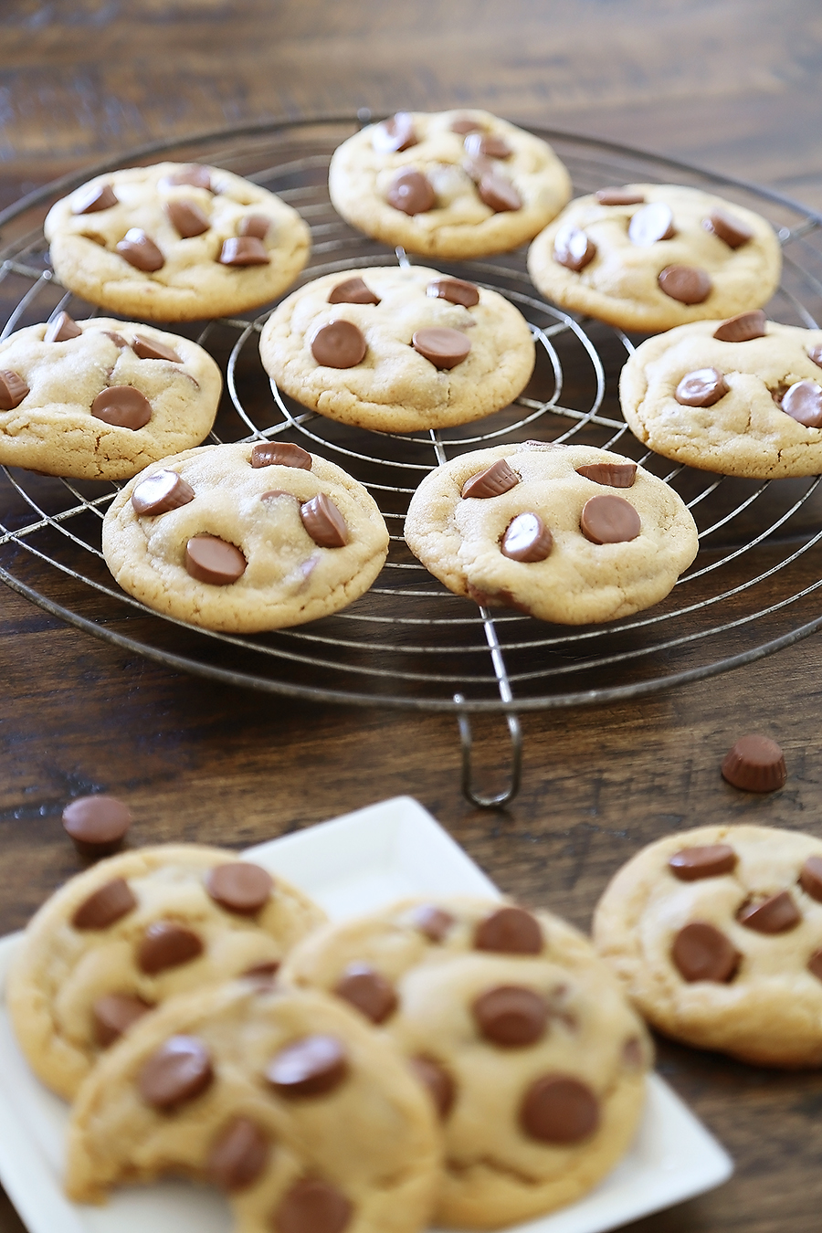 Soft Peanut Butter Cup Cookies - Perfectly soft and chewy peanut butter cookies, with gooey chocolate peanut butter cups hidden inside! Thecomfortofcooking.com