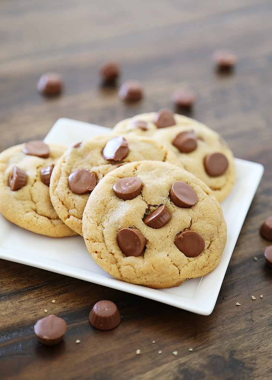 Soft Peanut Butter Cup Cookies - Perfectly soft and chewy peanut butter cookies, with gooey chocolate peanut butter cups hidden inside! Thecomfortofcooking.com