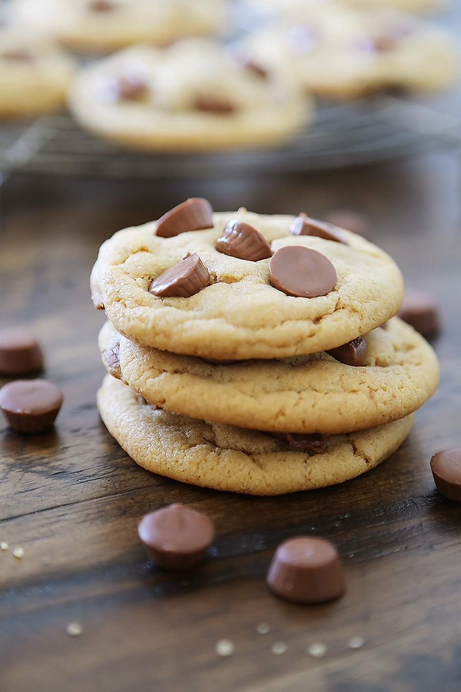 Soft Peanut Butter Cup Cookies - Perfectly soft and chewy peanut butter cookies, with gooey chocolate peanut butter cups hidden inside! Thecomfortofcooking.com