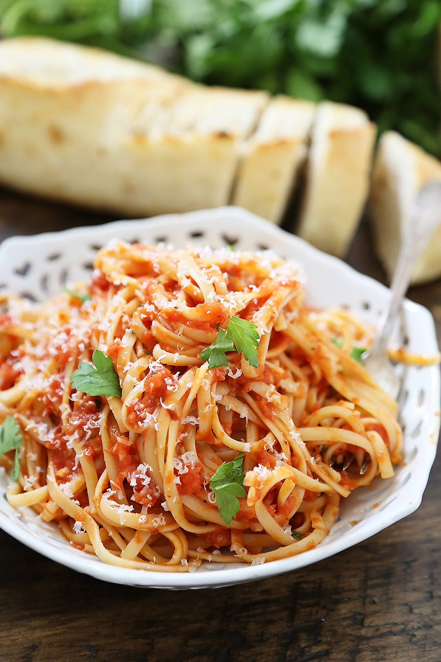 5-Ingredient Butter Roasted Tomato Sauce with Linguine - One of the most delicious, easy tomato + butter pasta sauces ever! Toss with hot cooked pasta and top with fresh Parmesan. So simple and scrumptious for weeknights! Thecomfortofcooking.com