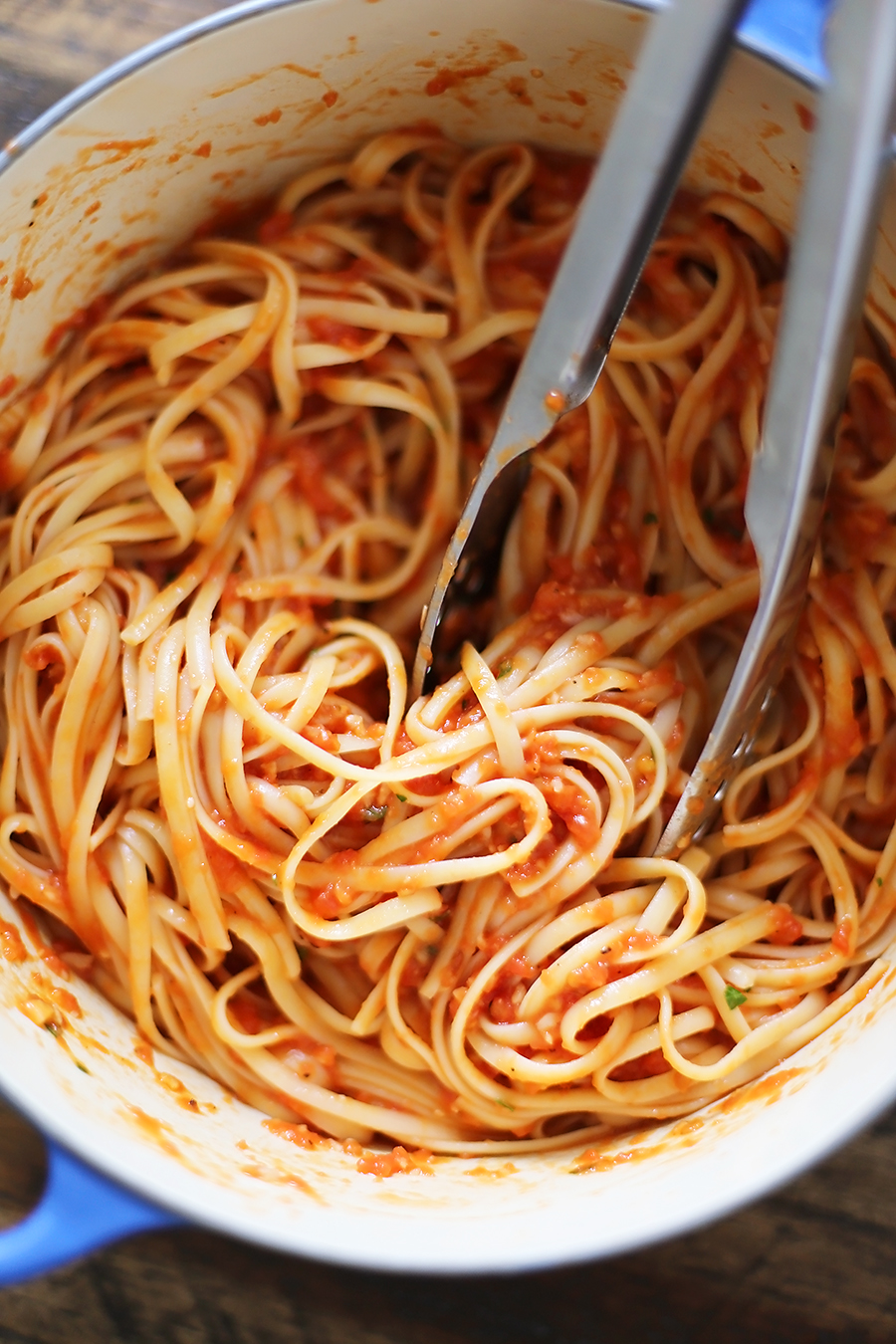 5-Ingredient Butter Roasted Tomato Sauce with Linguine - One of the most delicious, easy tomato + butter pasta sauces ever! Toss with hot cooked pasta and top with fresh Parmesan. So simple and scrumptious for weeknights! Thecomfortofcooking.com