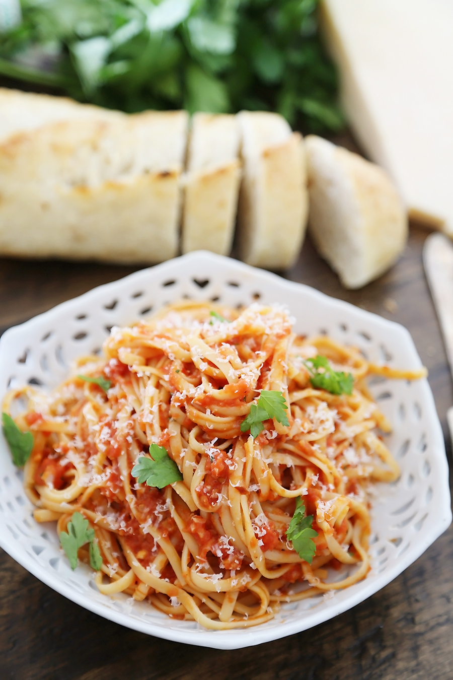 5-Ingredient Butter Roasted Tomato Sauce with Linguine - One of the most delicious, easy tomato + butter pasta sauces ever! Toss with hot cooked pasta and top with fresh Parmesan. So simple and scrumptious for weeknights! Thecomfortofcooking.com