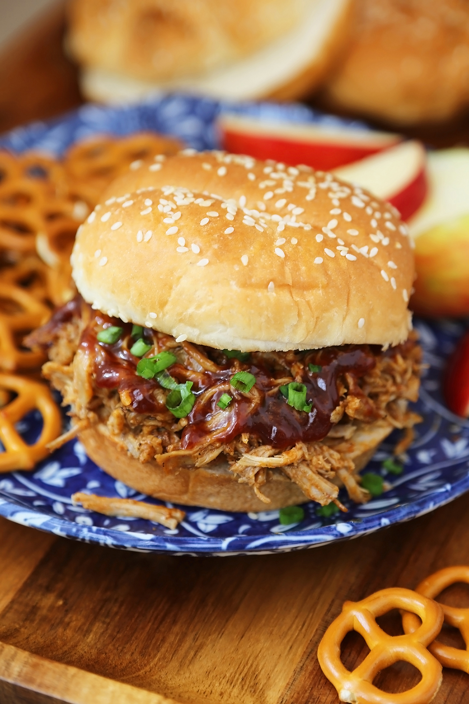 Slow Cooker Apple Cider BBQ Pulled Pork - Our best-ever pulled pork with a tangy, sweet apple cider BBQ sauce! Perfect slow cooker food for weeknight dinners or hungry crowds. thecomfortofcooking.com