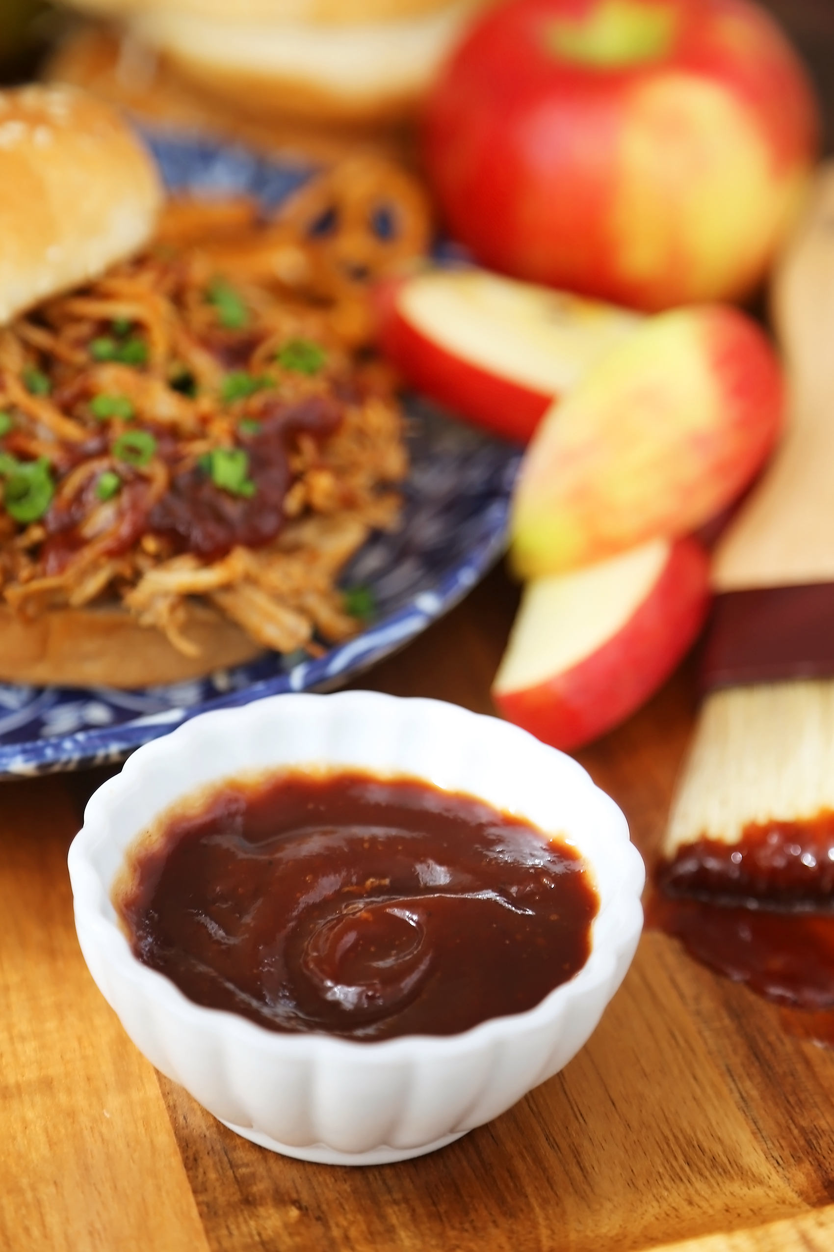 Slow Cooker Apple Cider BBQ Pulled Pork - Our best-ever pulled pork with a tangy, sweet apple cider BBQ sauce! Perfect slow cooker food for weeknight dinners or hungry crowds. thecomfortofcooking.com