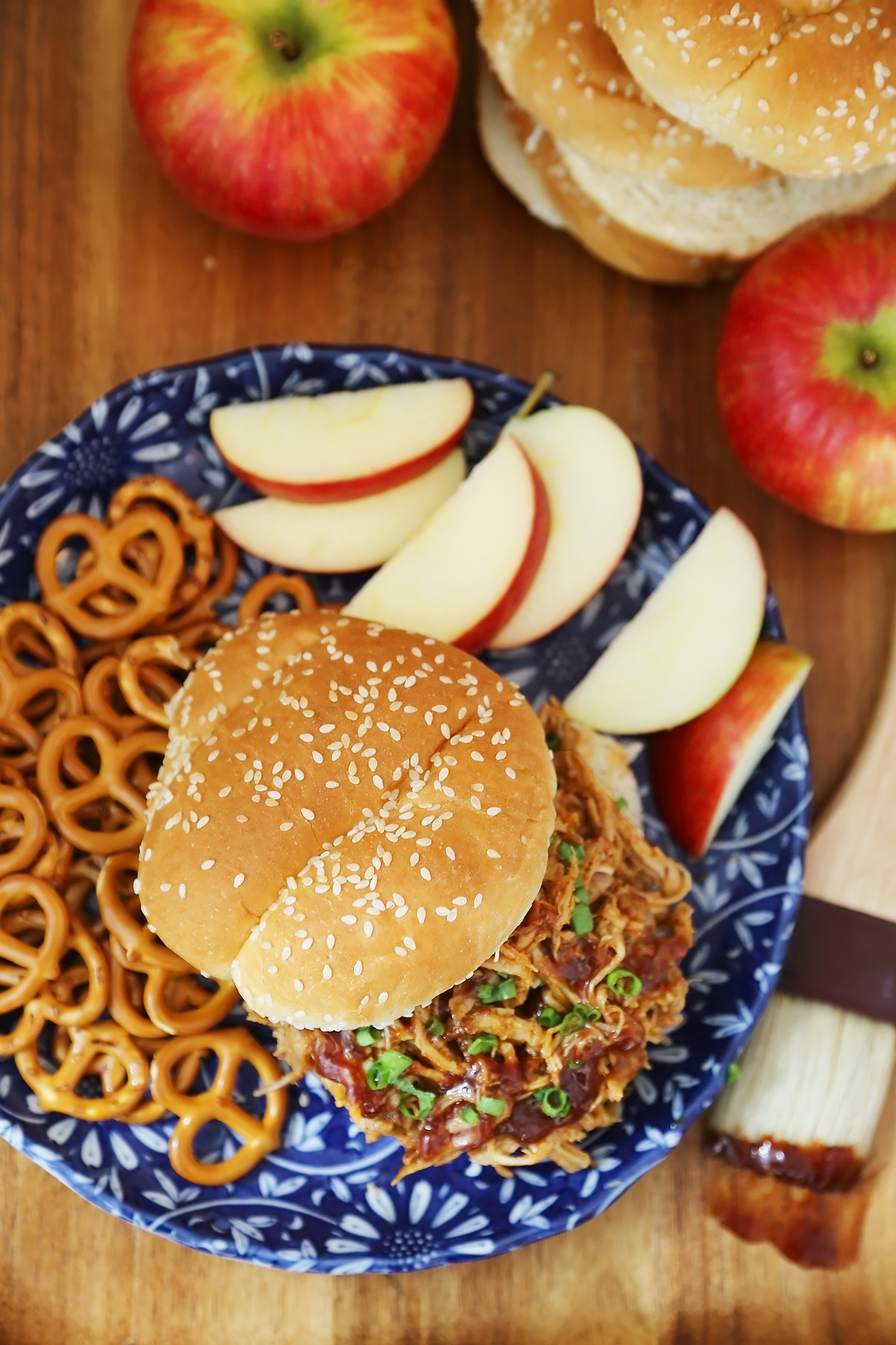 Slow Cooker Apple Cider BBQ Pulled Pork - Our best-ever pulled pork with a tangy, sweet apple cider BBQ sauce! Perfect slow cooker food for weeknight dinners or hungry crowds. thecomfortofcooking.com