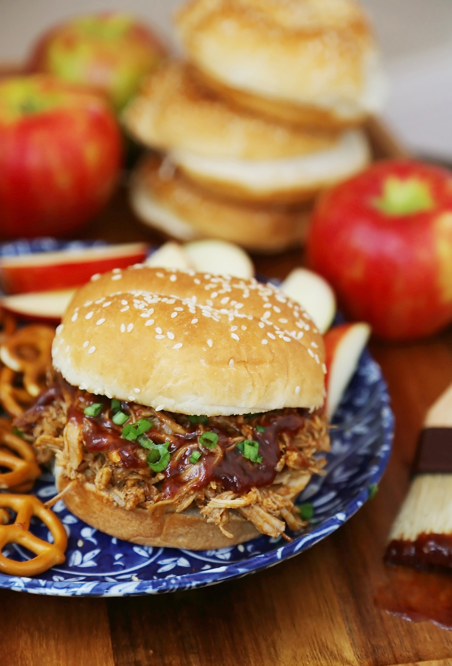 Slow Cooker Apple Cider BBQ Pulled Pork - Our best-ever pulled pork with a tangy, sweet apple cider BBQ sauce! Perfect slow cooker food for weeknight dinners or hungry crowds. thecomfortofcooking.com