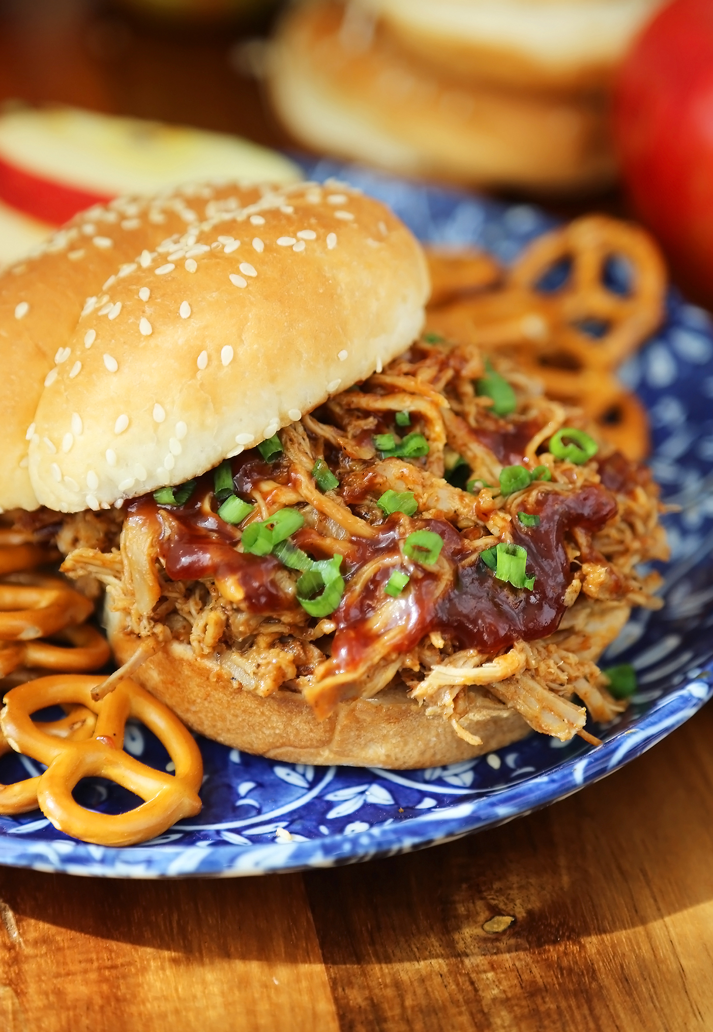 Slow Cooker Apple Cider BBQ Pulled Pork - Our best-ever pulled pork with a tangy, sweet apple cider BBQ sauce! Perfect slow cooker food for weeknight dinners or hungry crowds. thecomfortofcooking.com