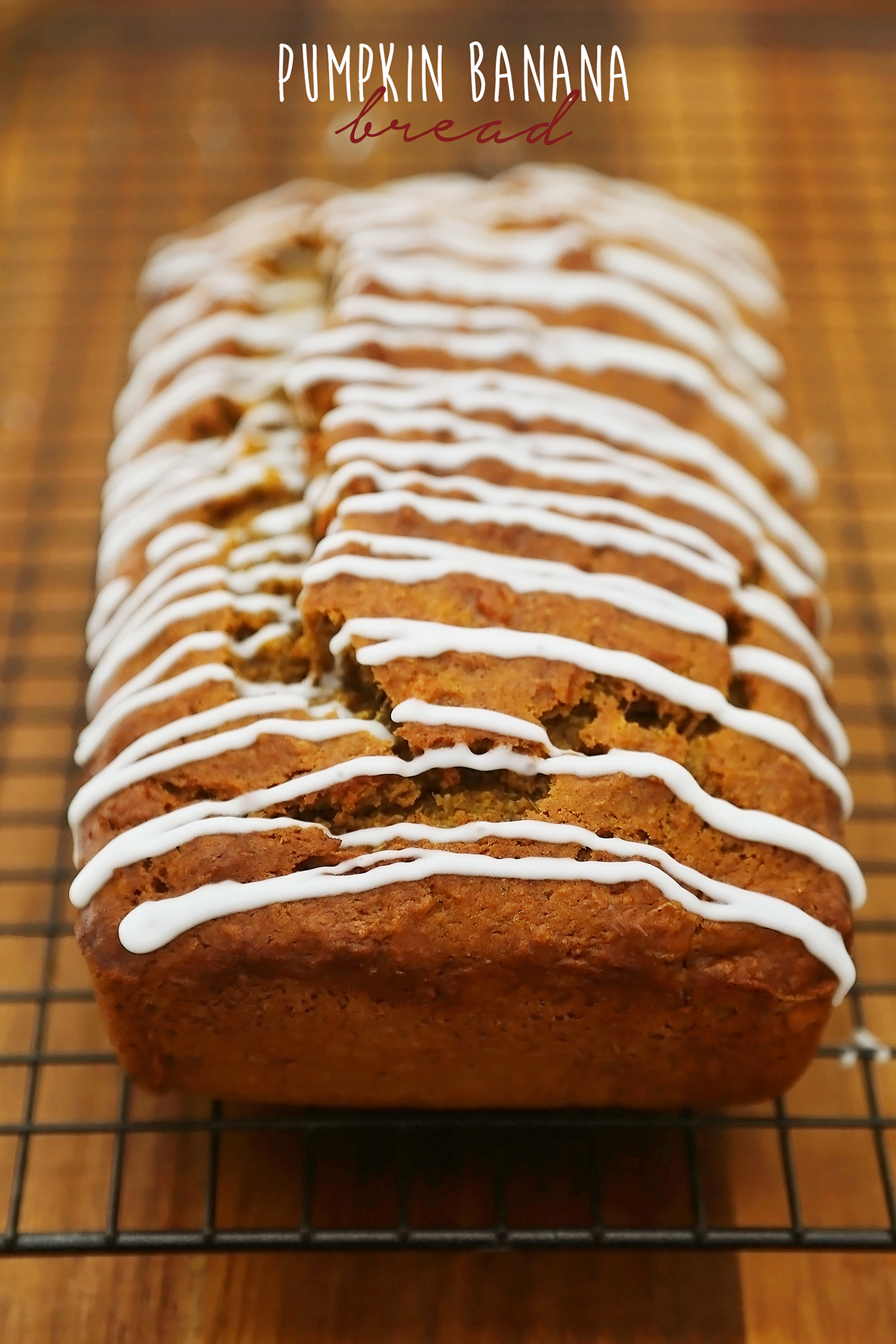 Pumpkin Banana Bread with Vanilla Glaze - Super moist, fluffy pumpkin-banana bread easily baked from scratch! Perfect for gifting or enjoying for breakfast, brunch or dessert. Thecomfortofcooking.com