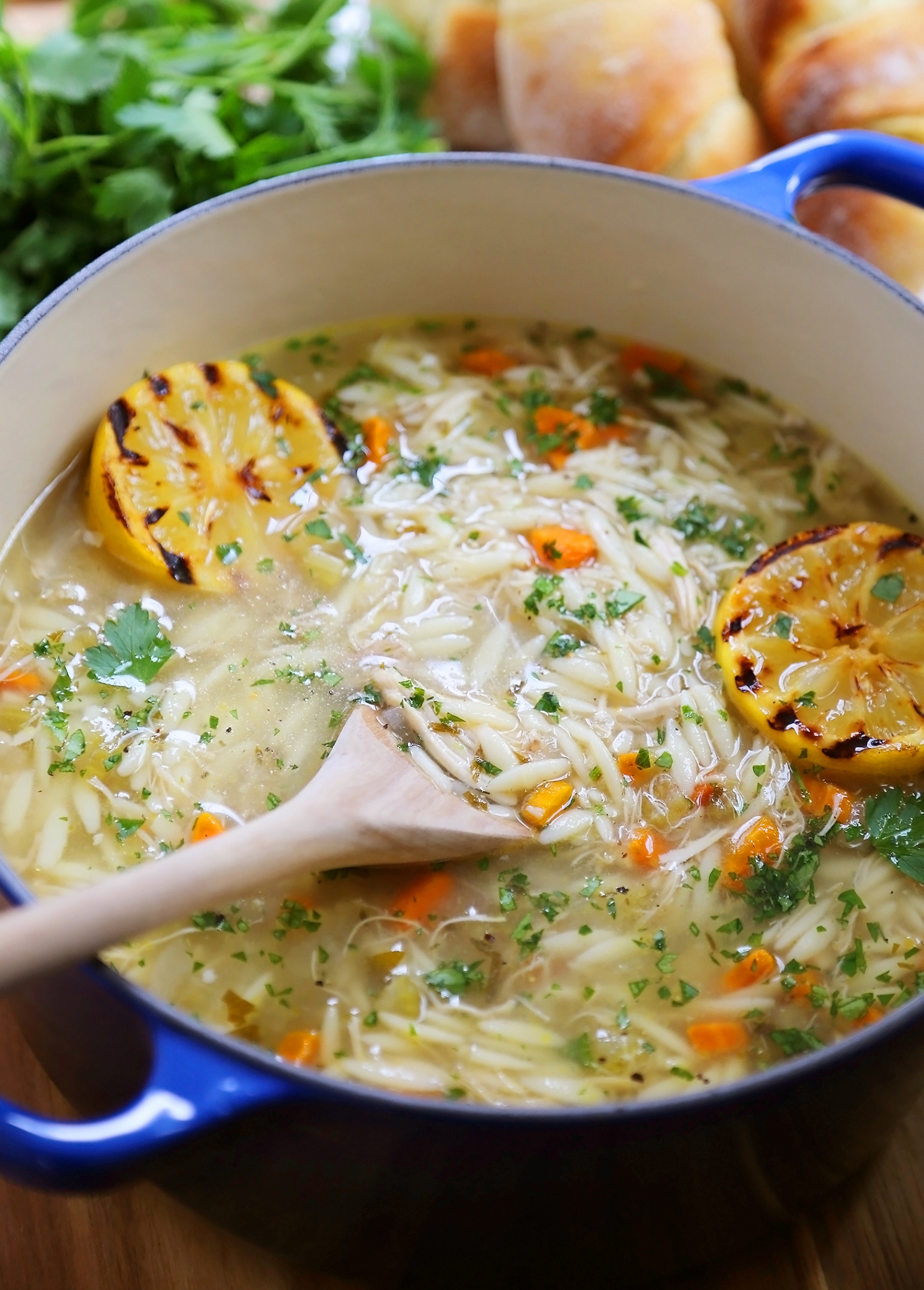 Lemon Orzo Chicken Soup - Full of veggies, tender orzo and fresh lemon juice, the bright flavors and hot broth are full of comforting goodness. Thecomfortofcooking.com