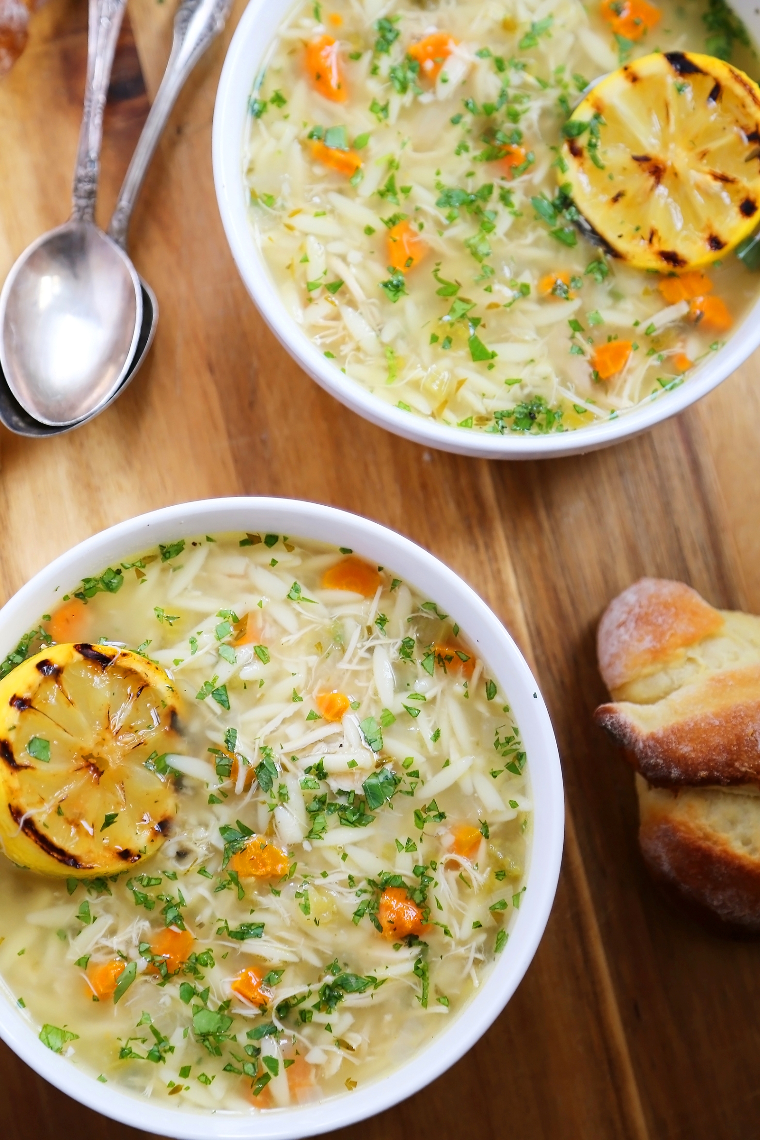 Lemon Orzo Chicken Soup - Full of veggies, tender orzo and fresh lemon juice, the bright flavors and hot broth are full of comforting goodness. Thecomfortofcooking.com