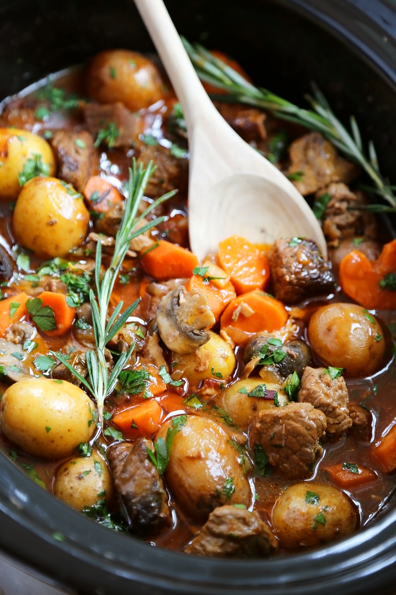 Slow Cooker Beef Bourguignon - Hearty veggies meet juicy, tender beef in this classic French stew. Thecomfortofcooking.com