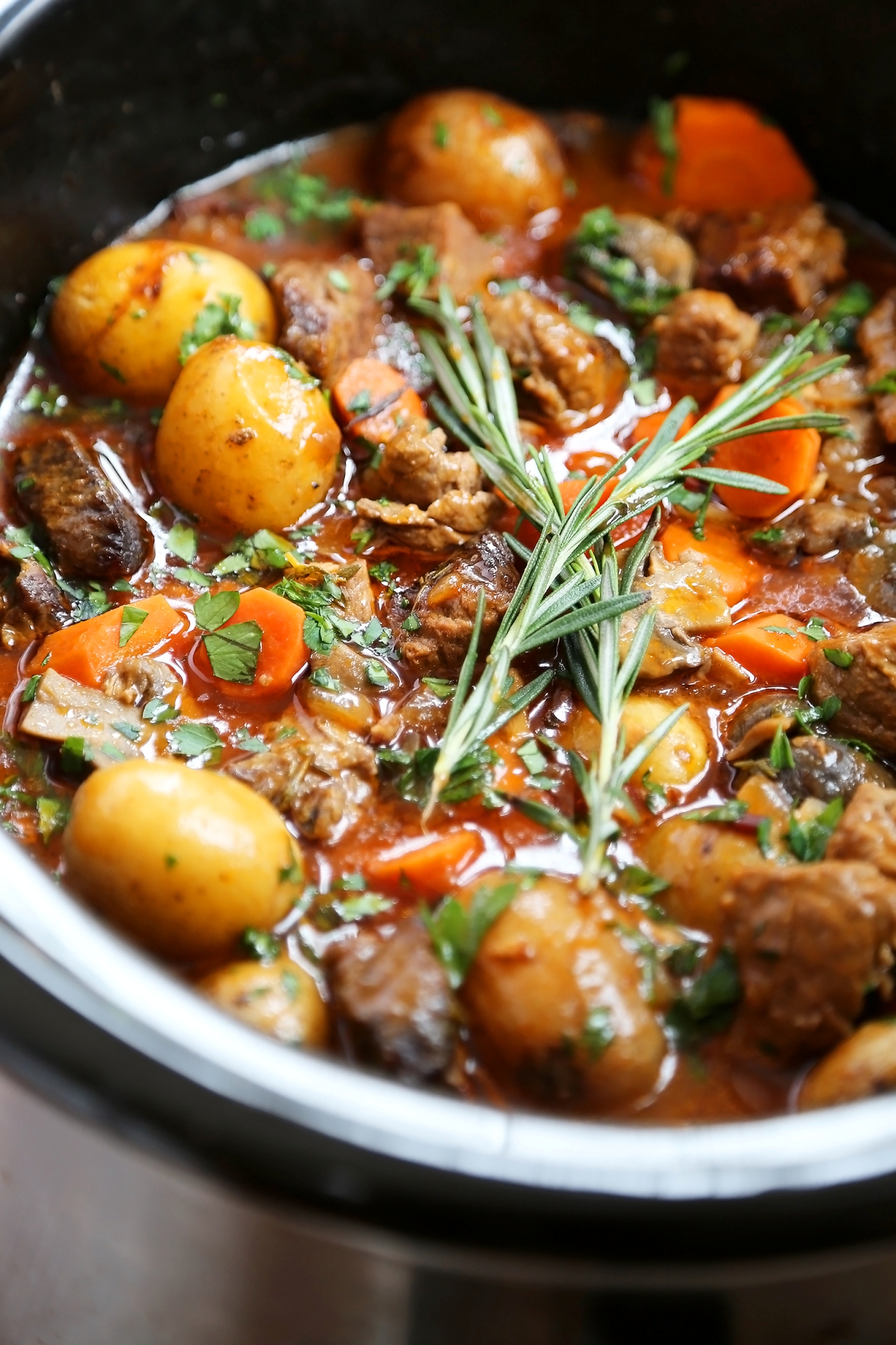 Slow Cooker Beef Bourguignon - Hearty veggies meet juicy, tender beef in this classic French stew. Thecomfortofcooking.com