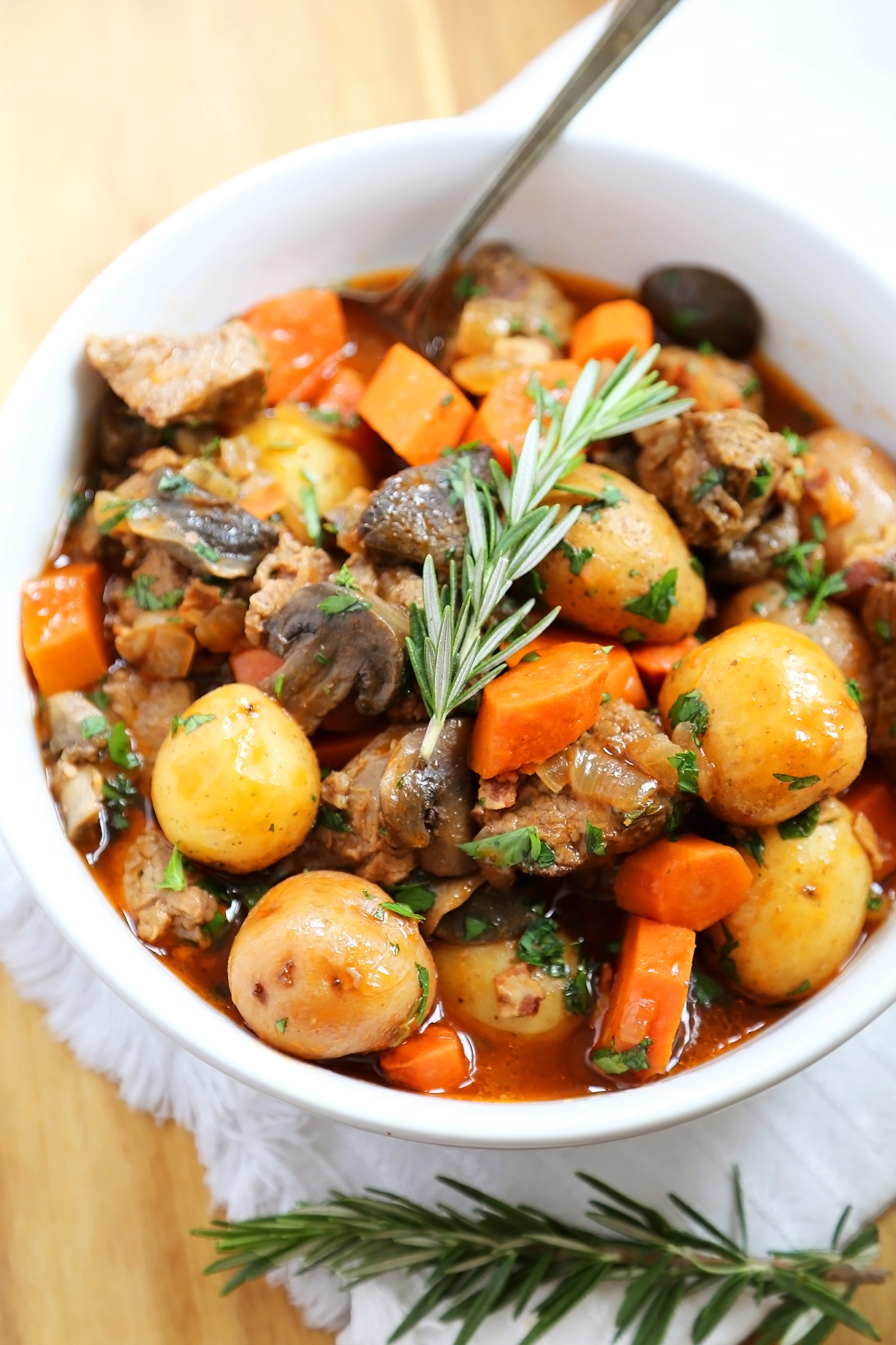 Slow Cooker Beef Bourguignon - Hearty veggies meet juicy, tender beef in this classic French stew. Thecomfortofcooking.com