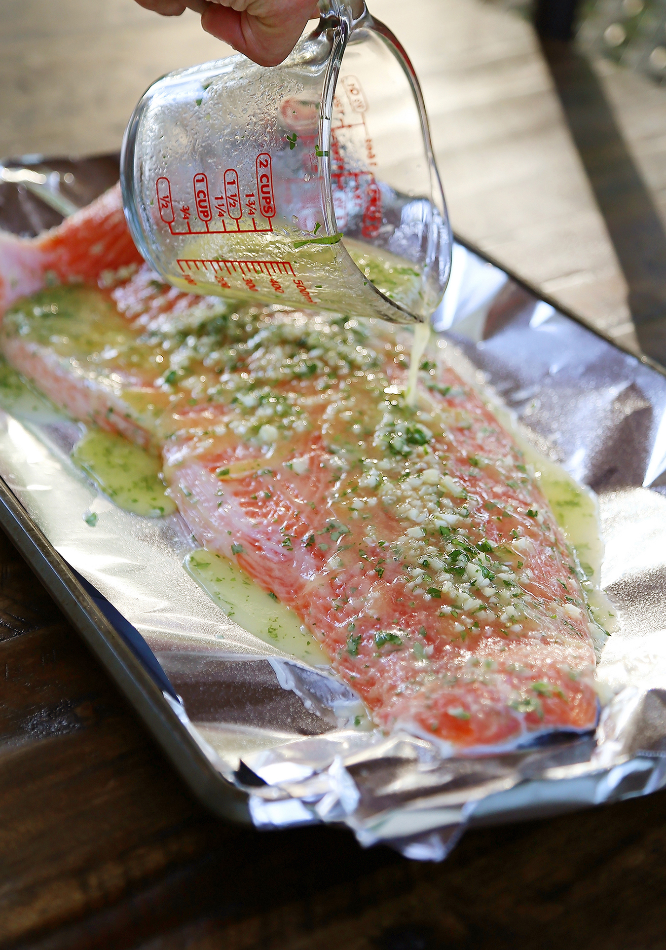 Honey Cilantro Lime Salmon in Foil - Buttery, flaky salmon fillet that melts in your mouth. So quick & easy! thecomfortofcooking.com