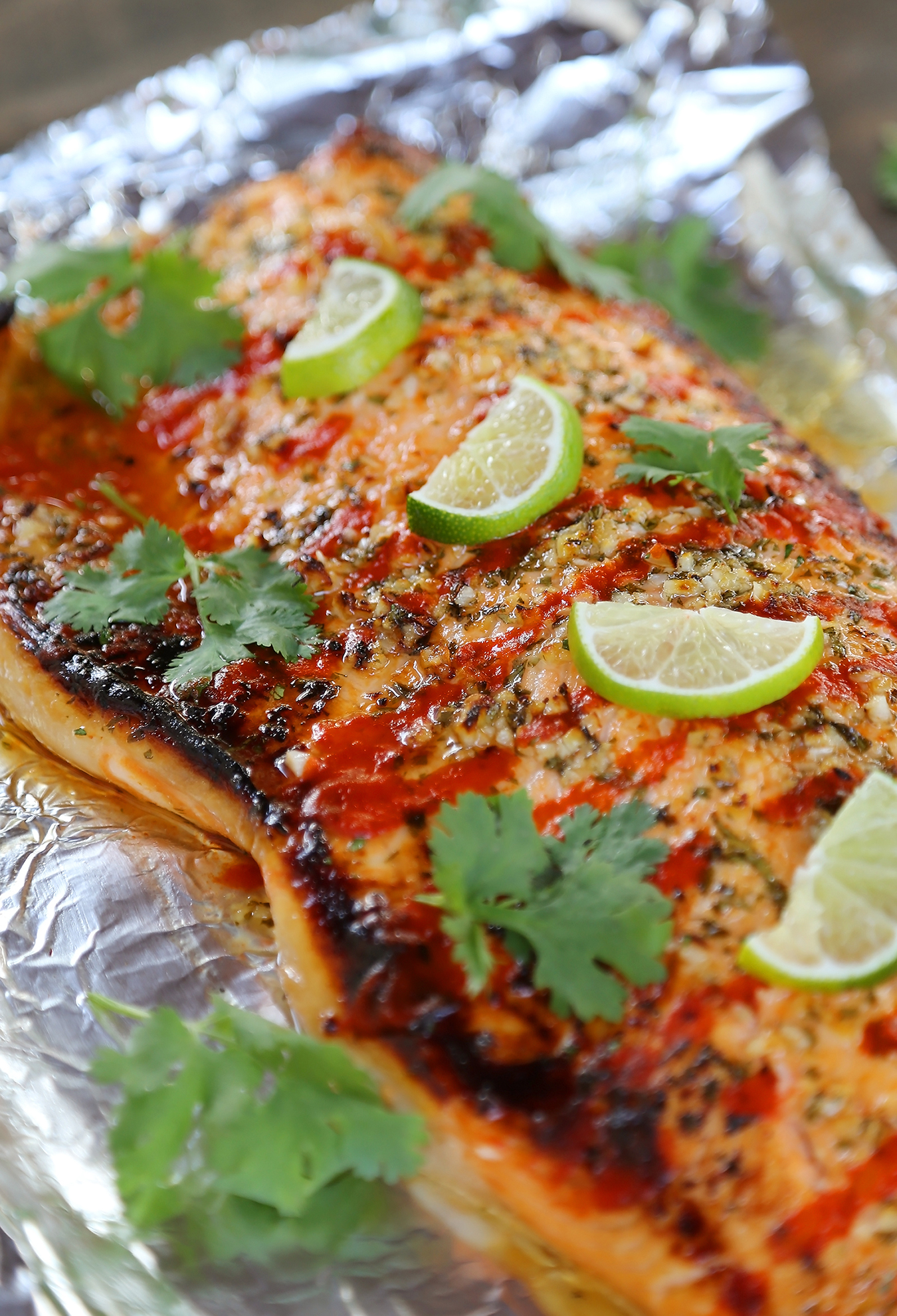 Honey Cilantro Lime Salmon in Foil - Buttery, flaky salmon fillet that melts in your mouth. So quick & easy! thecomfortofcooking.com