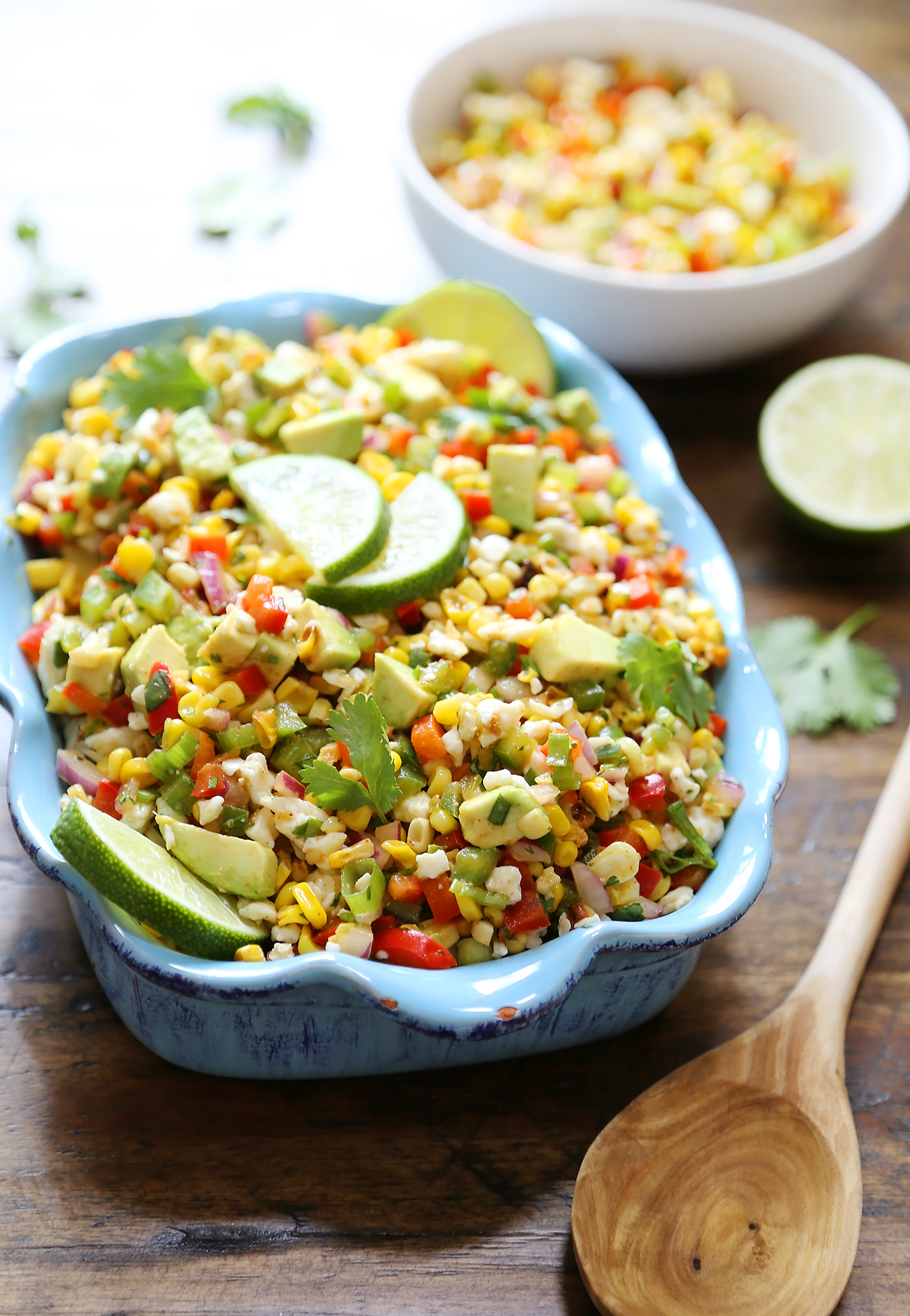 Mexican Street Corn Salad - Crunchy, sweet and smoky avocado corn salad with creamy Mexican cheese! thecomfortofcooking.com