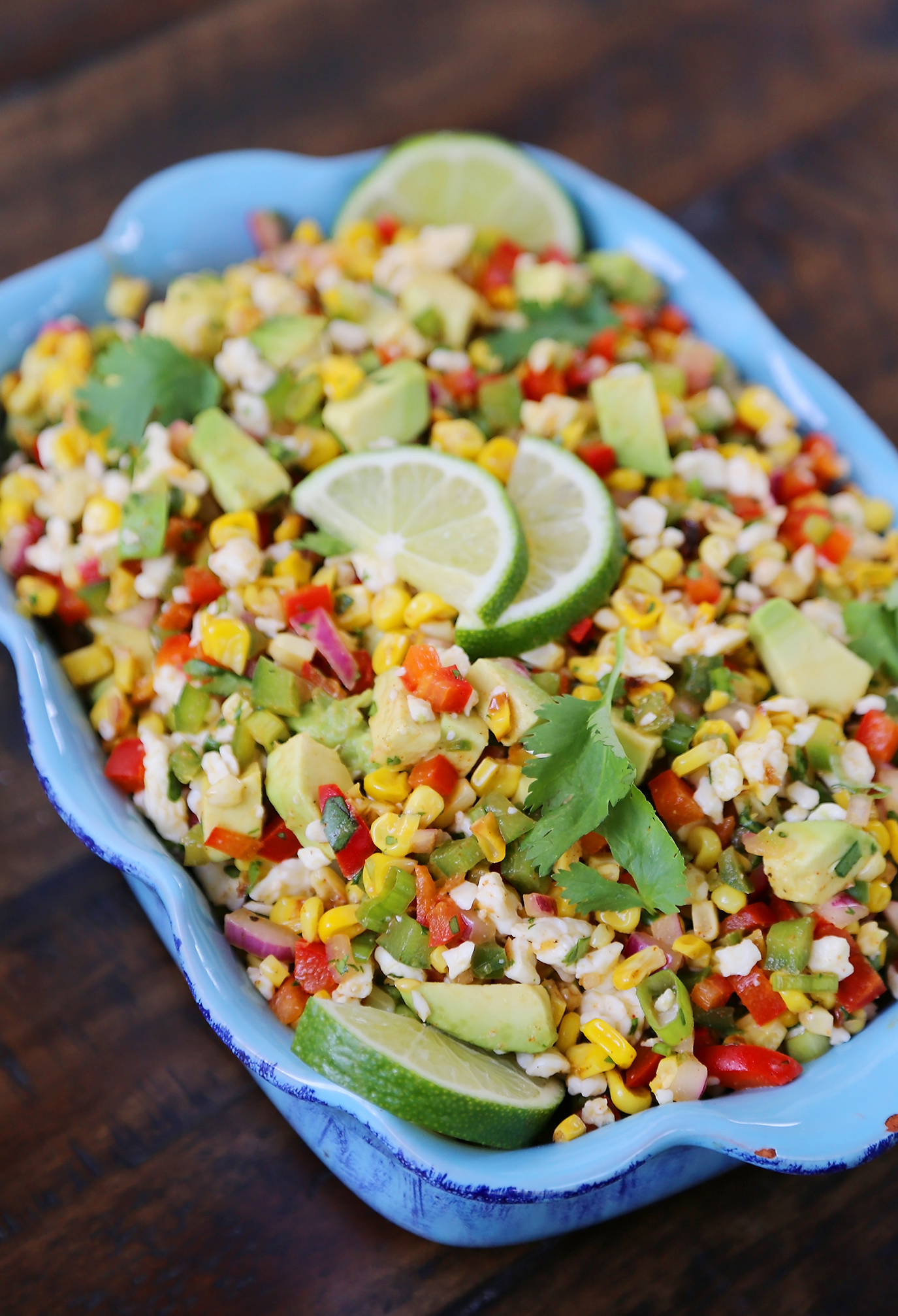 Mexican Street Corn Salad - Crunchy, sweet and smoky avocado corn salad with creamy Mexican cheese! thecomfortofcooking.com