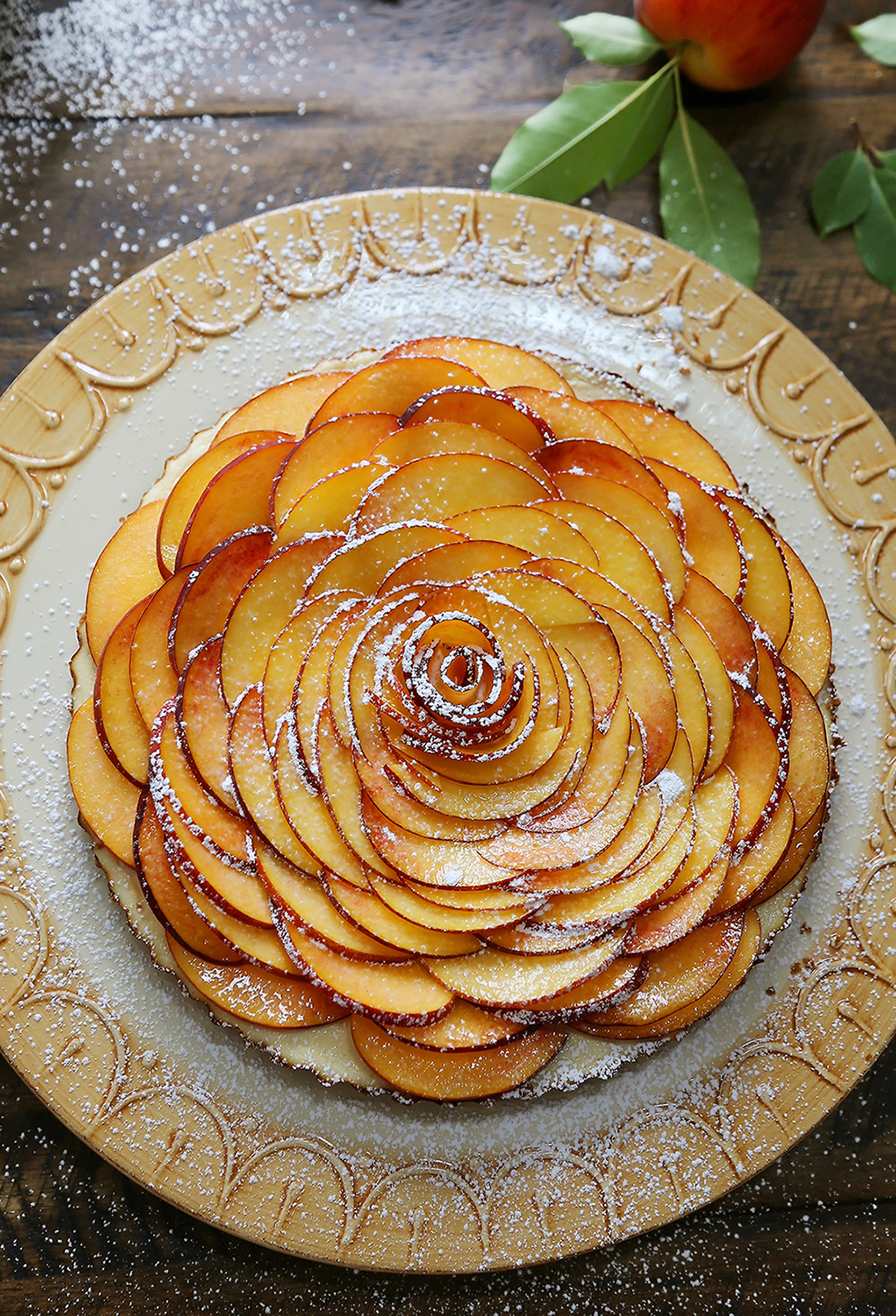 Creamy Peach and Honey Tart - Silky, rich cheesecake tart with a 5-ingredient filling. The perfect simple summer dessert! thecomfortofcooking.com