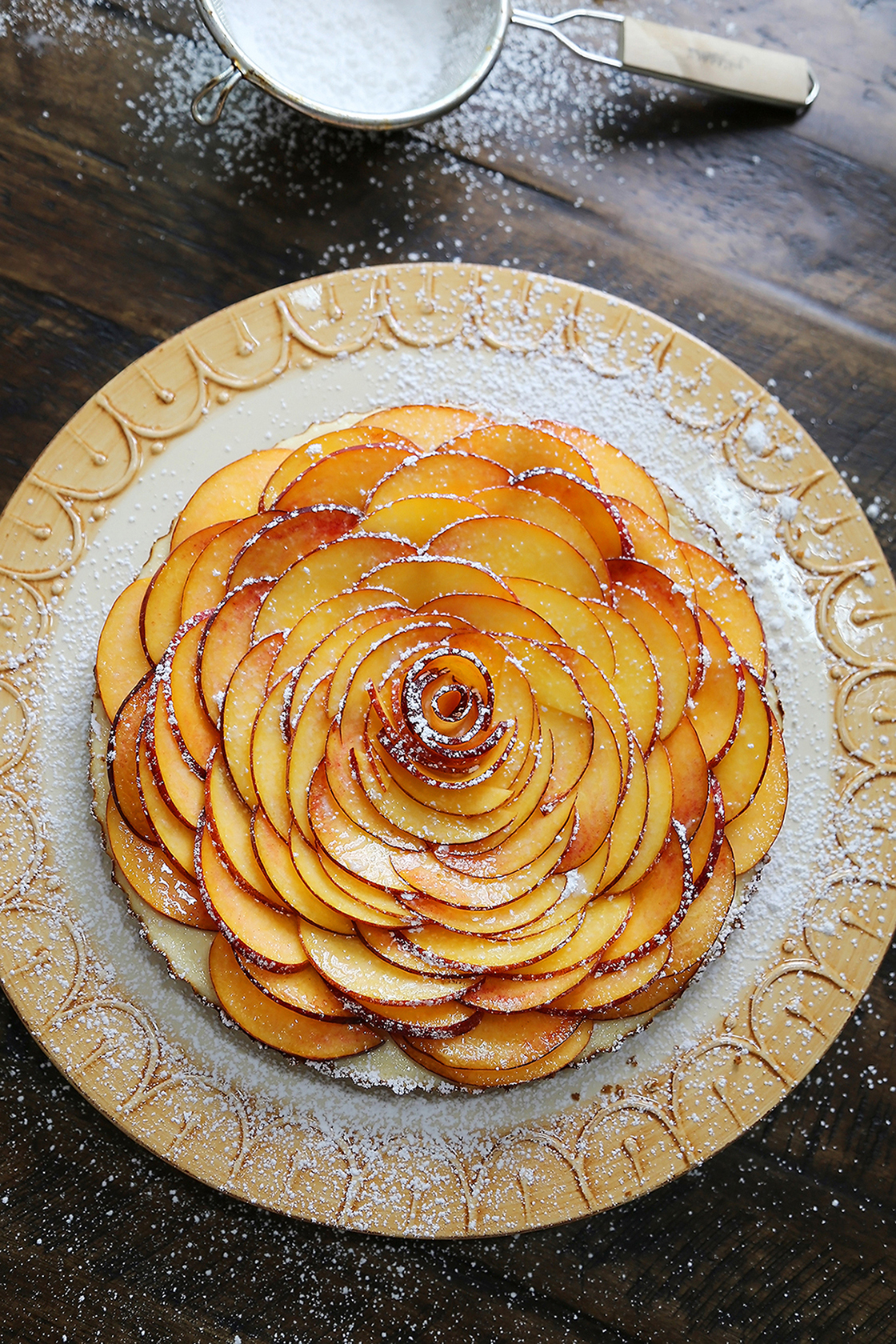 Creamy Peach and Honey Tart - Silky, rich cheesecake tart with a 5-ingredient filling. The perfect simple summer dessert! thecomfortofcooking.com