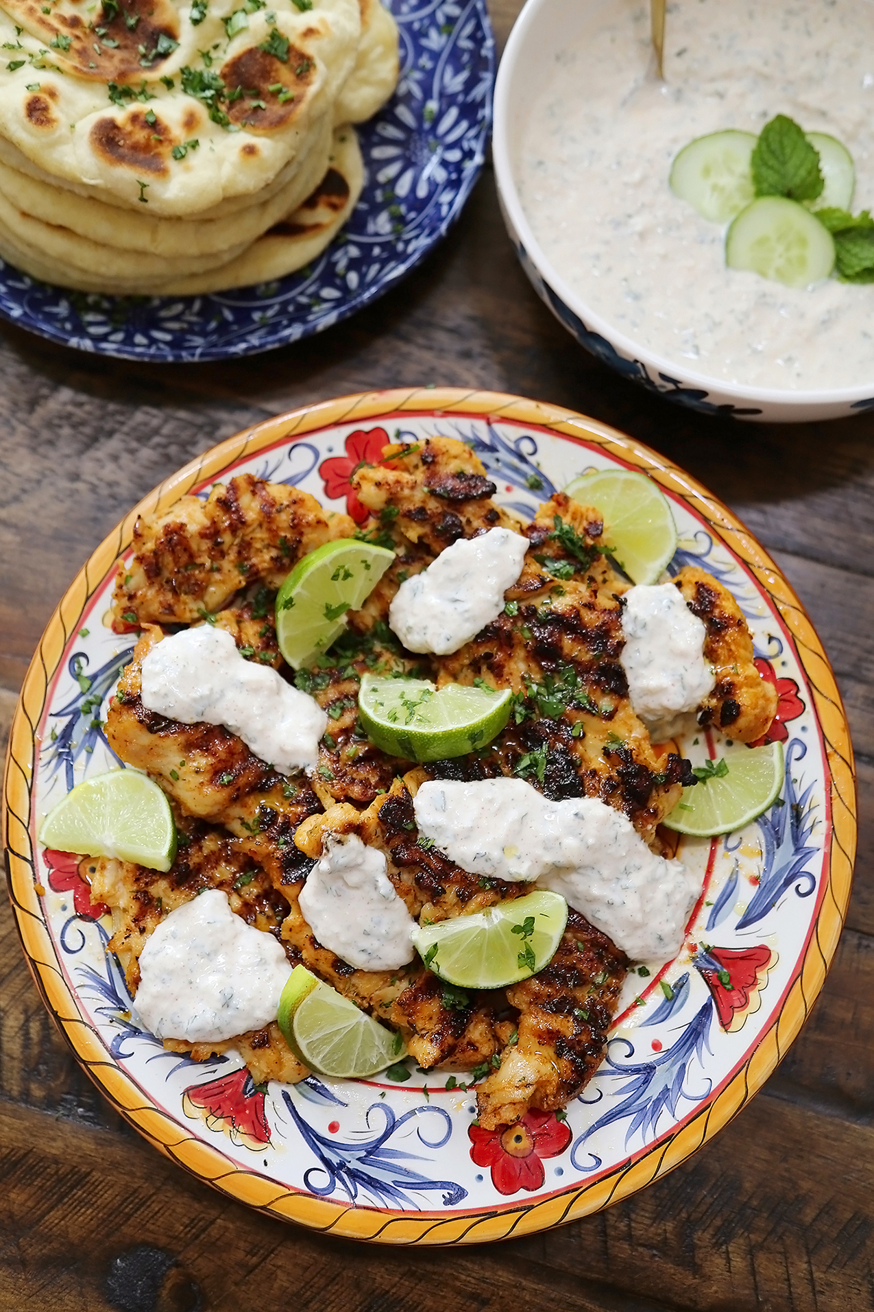 Chili-Lime Grilled Chicken with Cucumber-Mint Sauce - So delicious! Juicy grilled chicken with a cool, refreshing cucumber sauce made easy! thecomfortofcooking.com