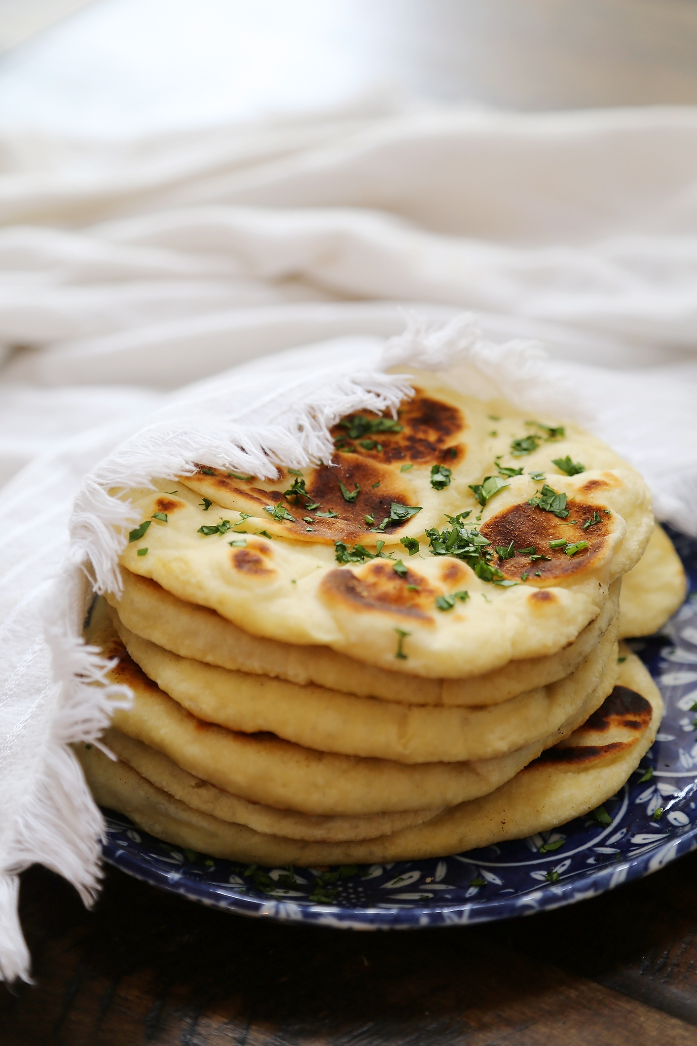 Homemade Naan (Soft Flatbread) - Soft, buttery and EASY flatbread made with only pantry ingredients! thecomfortofcooking.com